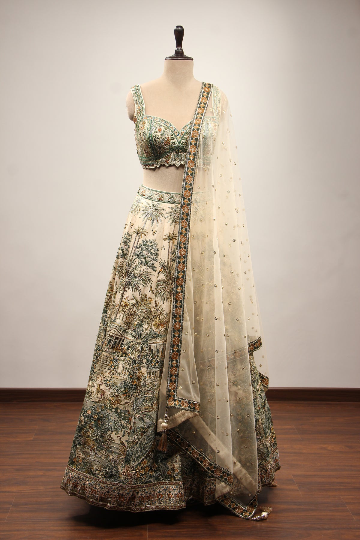 Beige Palm Printed Silk Lehenga with Hand Embroidery Crop Top – front view
