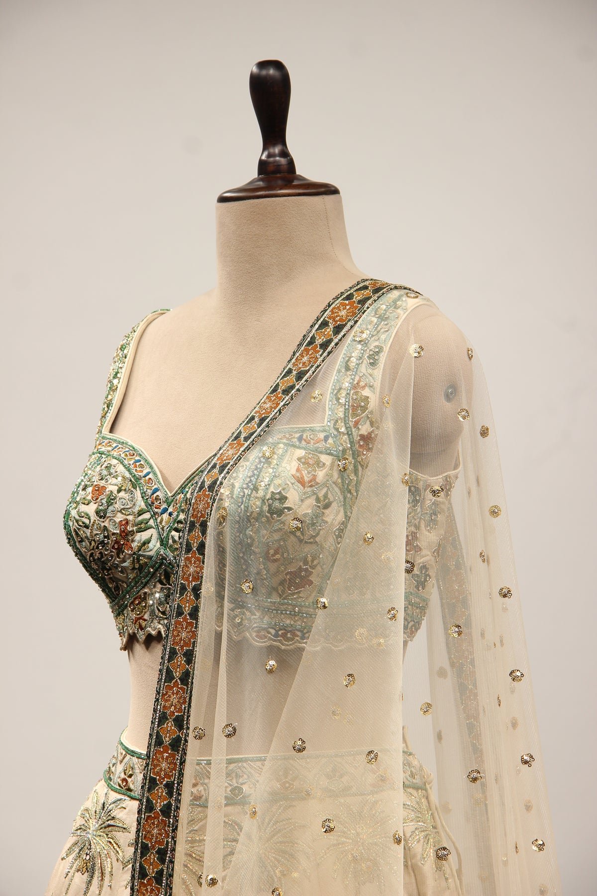 Beige Palm Printed Silk Lehenga with Hand Embroidery Crop Top – side close-up