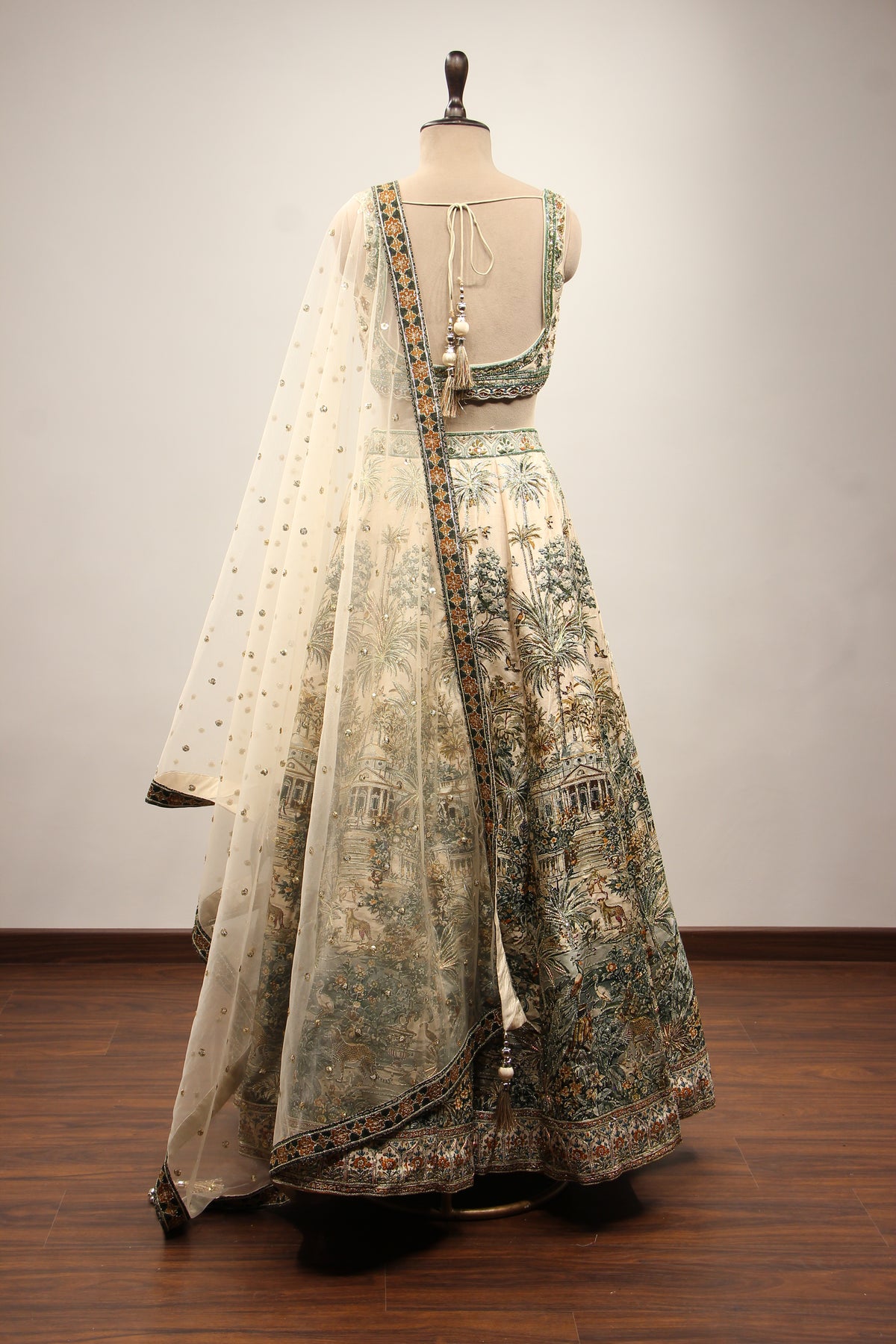 Beige Palm Printed Silk Lehenga with Hand Embroidery Crop Top – back view