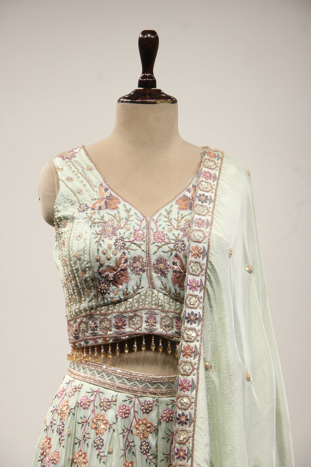 Sage Tissue Lehenga with Resham & Bead Handwork and Fringed Crop Top – front close-up