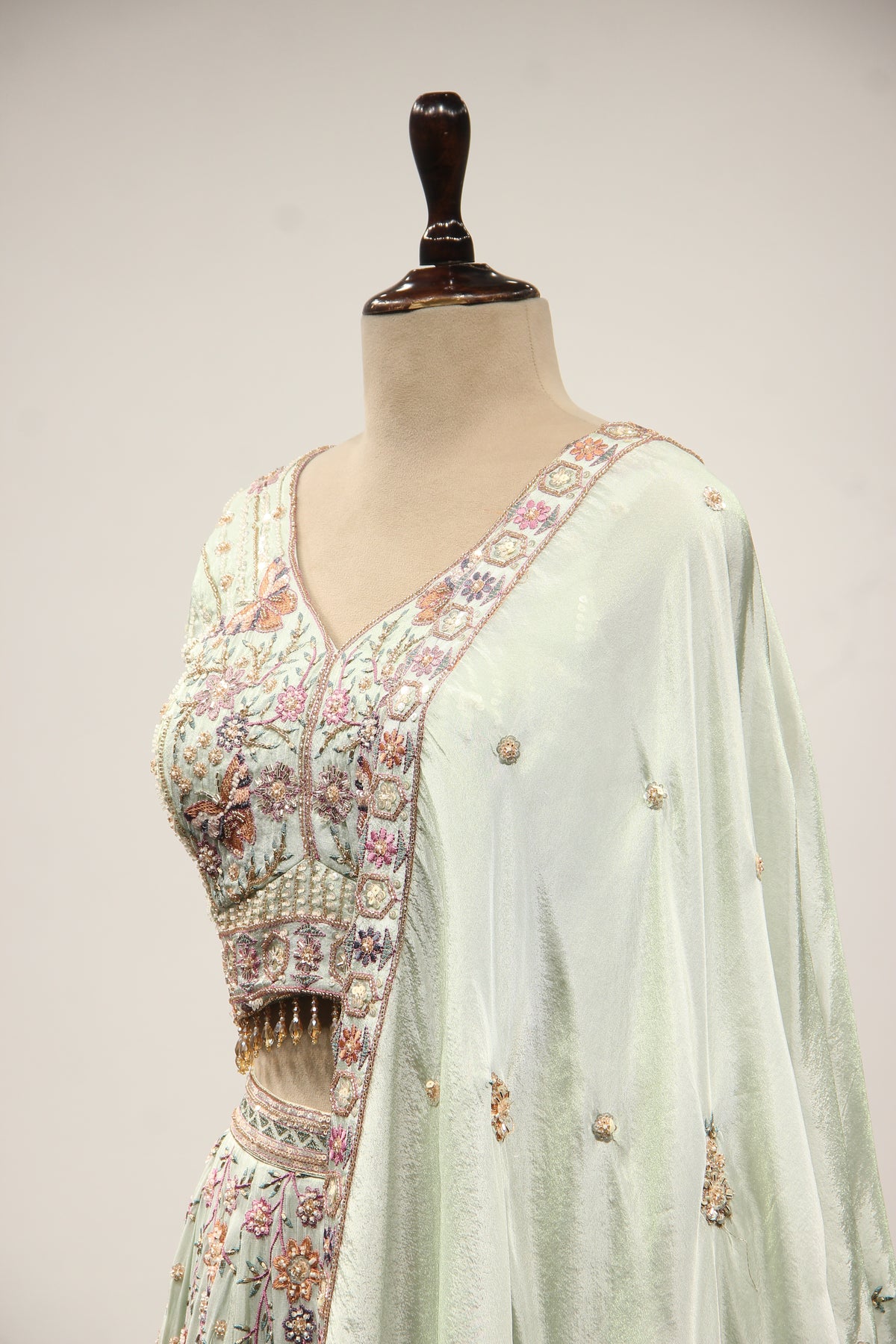 Sage Tissue Lehenga with Resham & Bead Handwork and Fringed Crop Top – side close-up