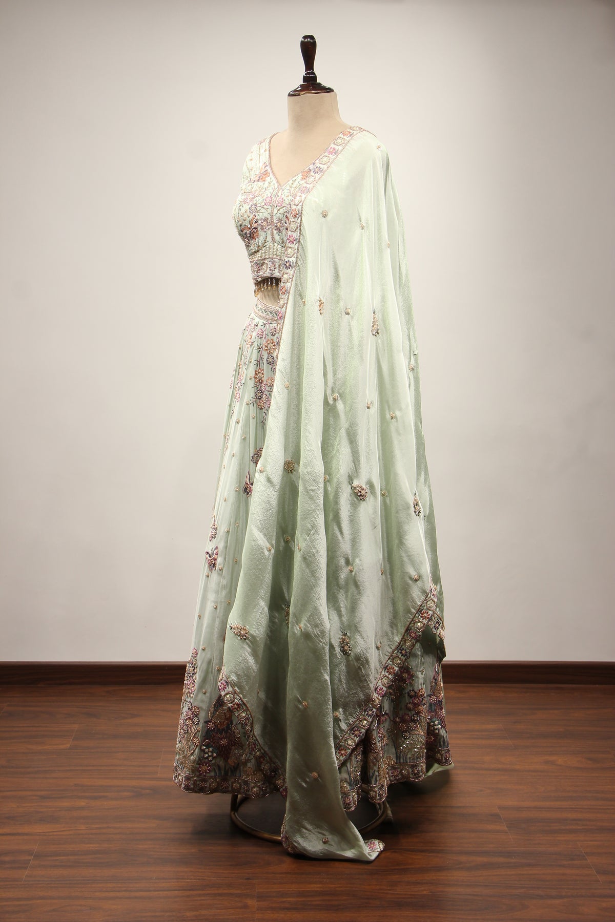 Sage Tissue Lehenga with Resham & Bead Handwork and Fringed Crop Top – side view