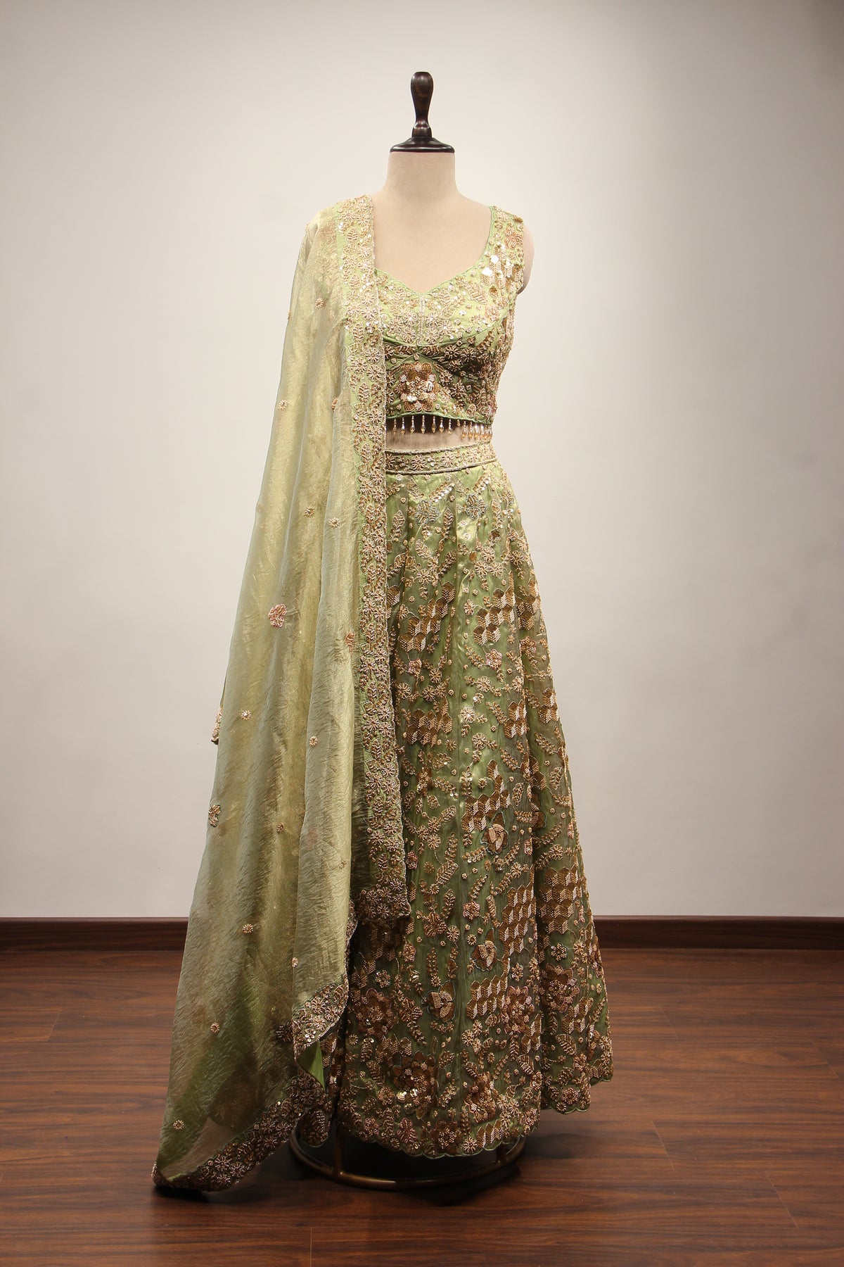 Green Shimmer Organza Lehenga with Bead & Zari Handwork Crop Top – front view