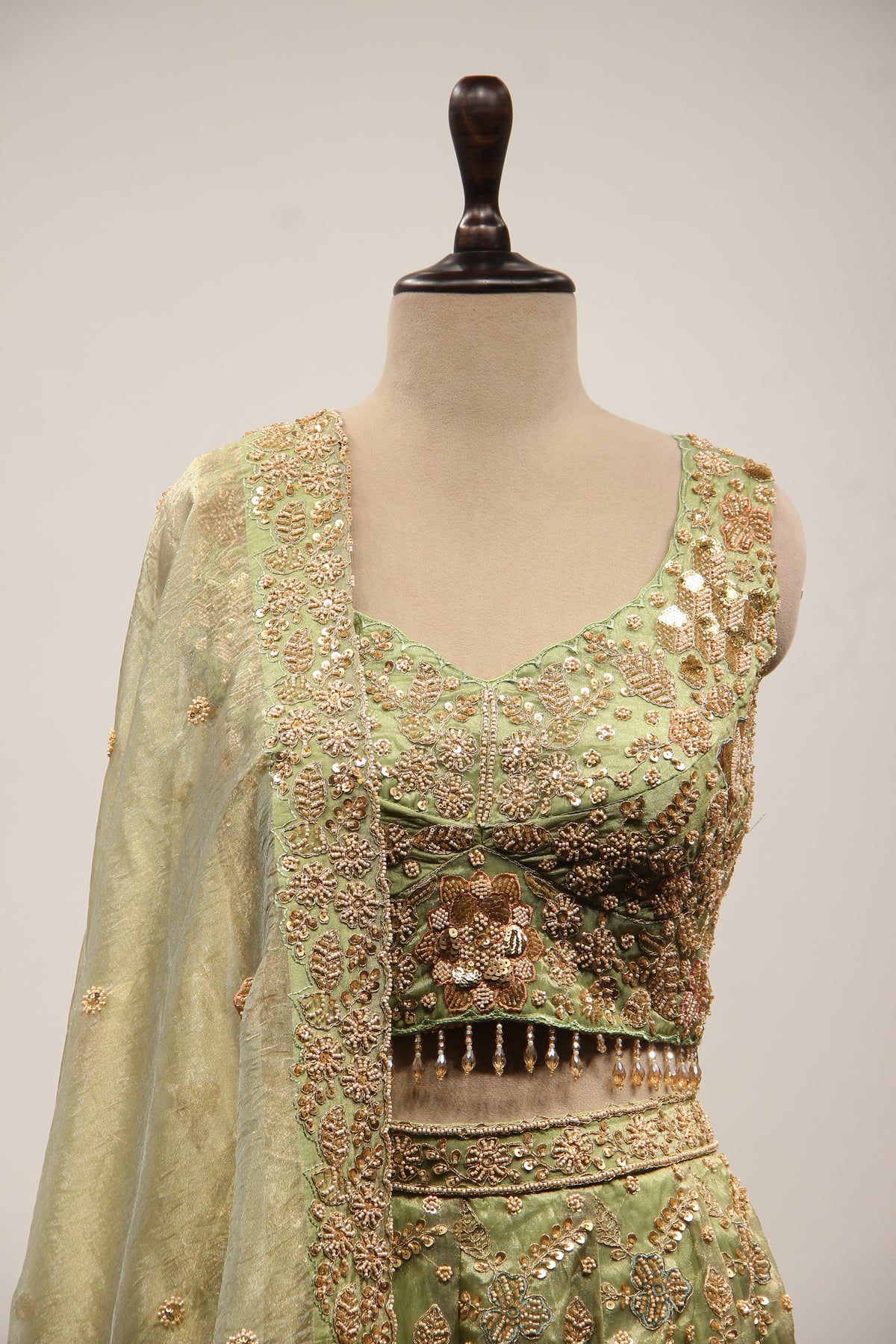 Green Shimmer Organza Lehenga with Bead & Zari Handwork Crop Top – front close-up