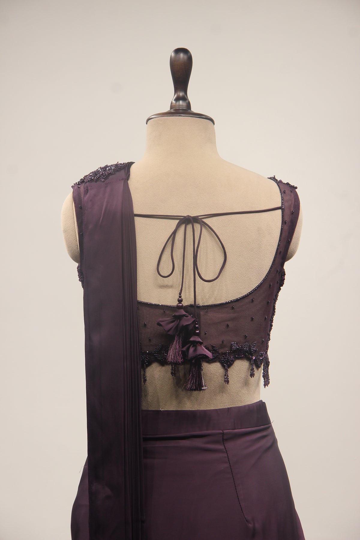 Satin Drape Saree with Beaded Net Corset in Cut Dana & Sequin Handwork in Purple – back close-up