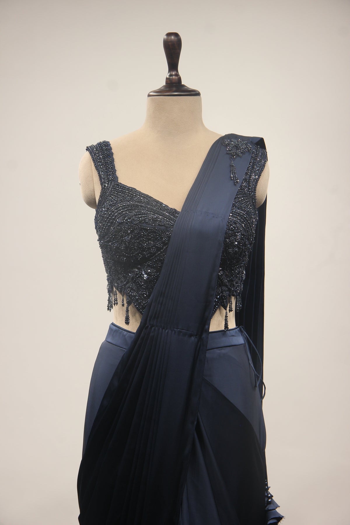 Satin Drape Saree with Beaded Net Corset in Cut Dana & Sequin Handwork in Blue – front close-up