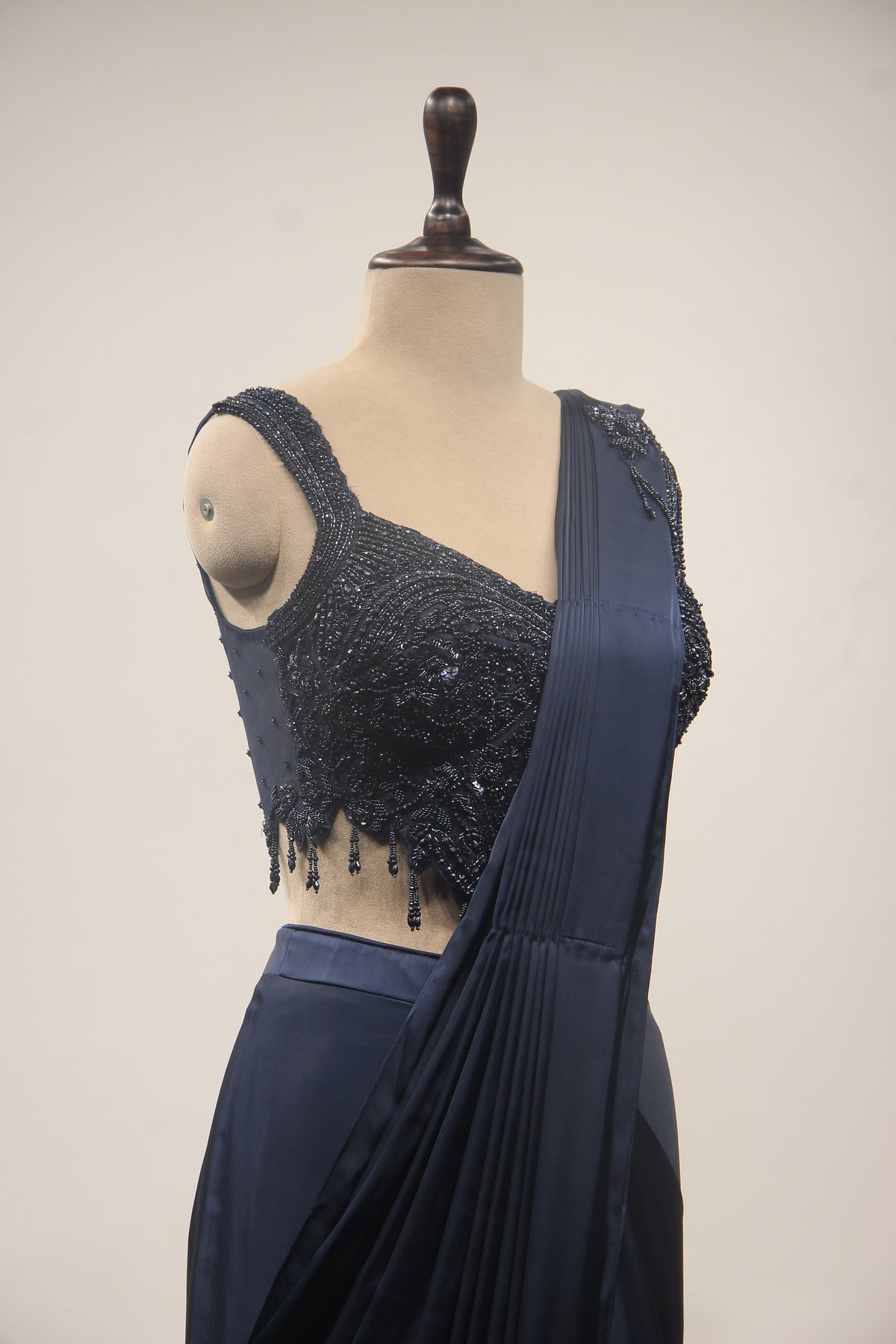 Satin Drape Saree with Beaded Net Corset in Cut Dana & Sequin Handwork in Blue – side close-up