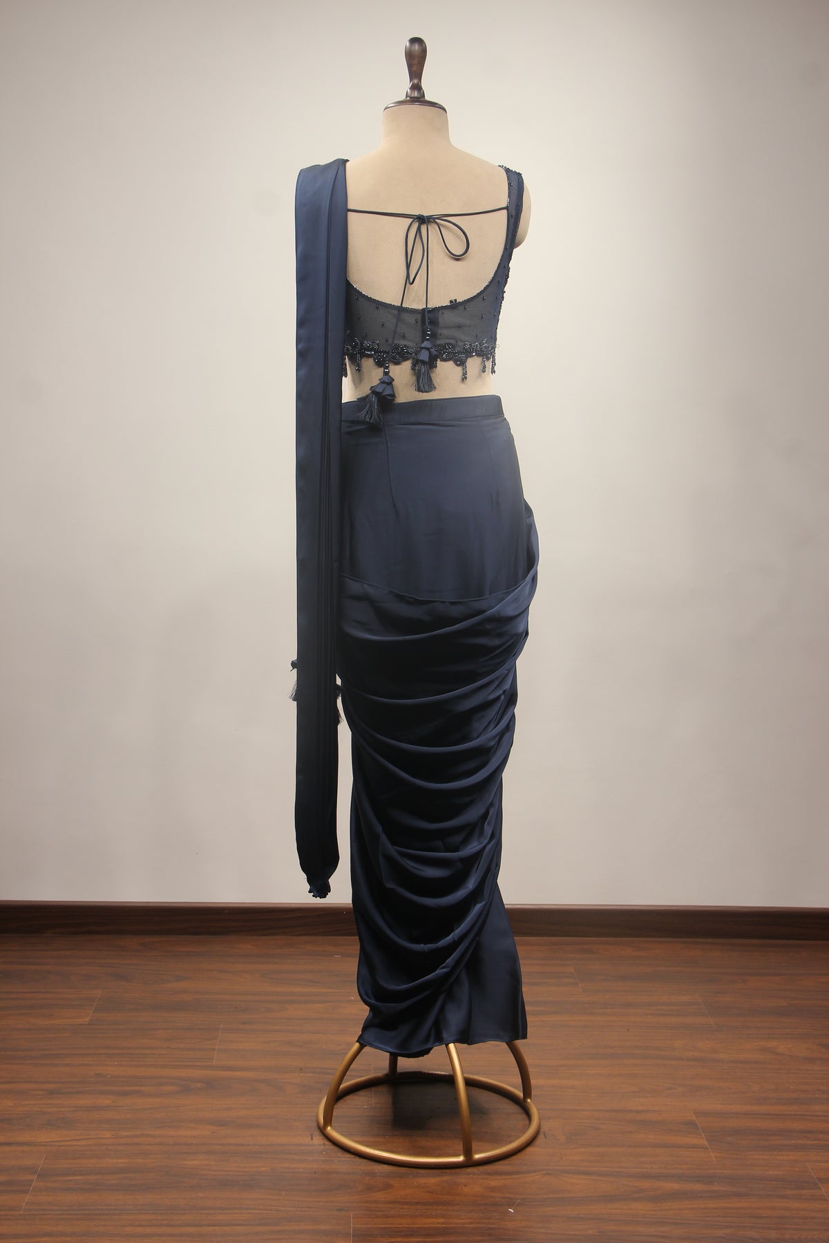 Satin Drape Saree with Beaded Net Corset in Cut Dana & Sequin Handwork in Blue – back view