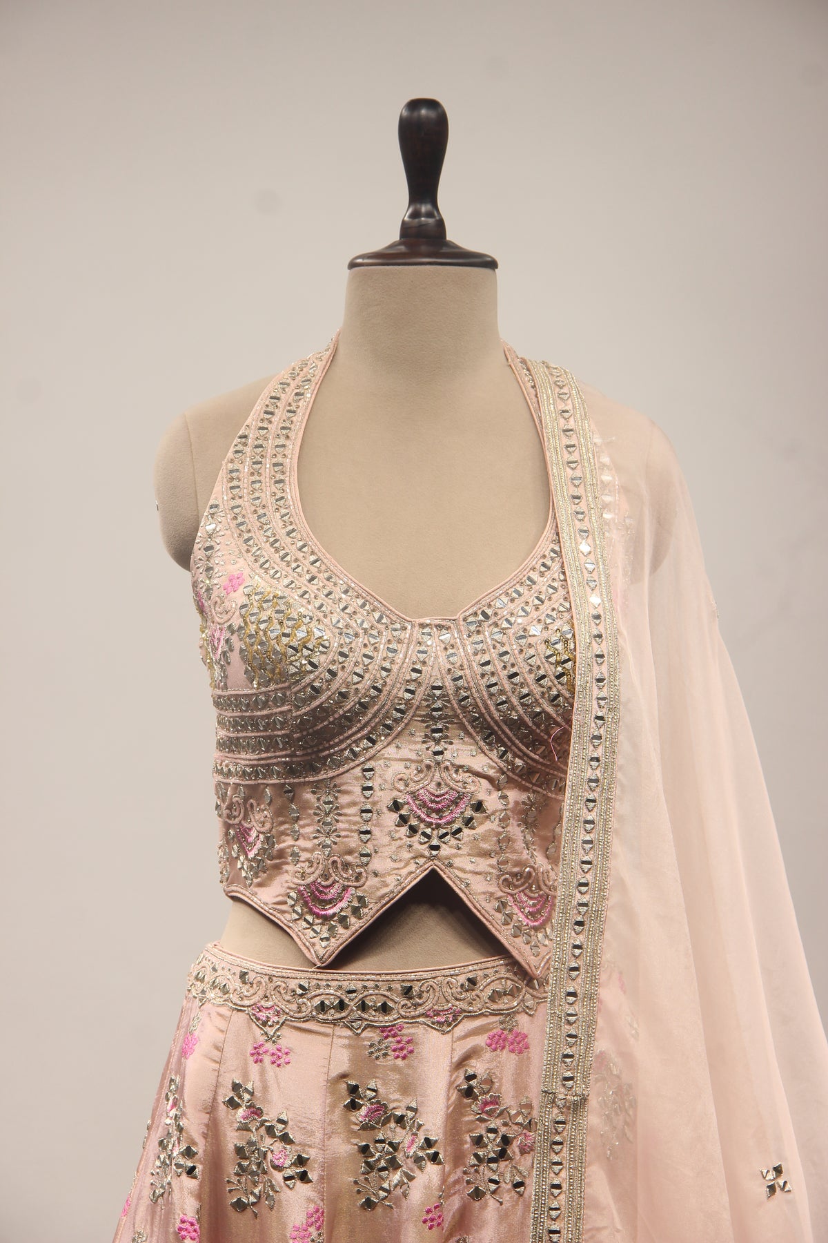 Baby Pink Tissue Lehenga with Mirror & Cut Dana Handwork Halter Corset – front close-up