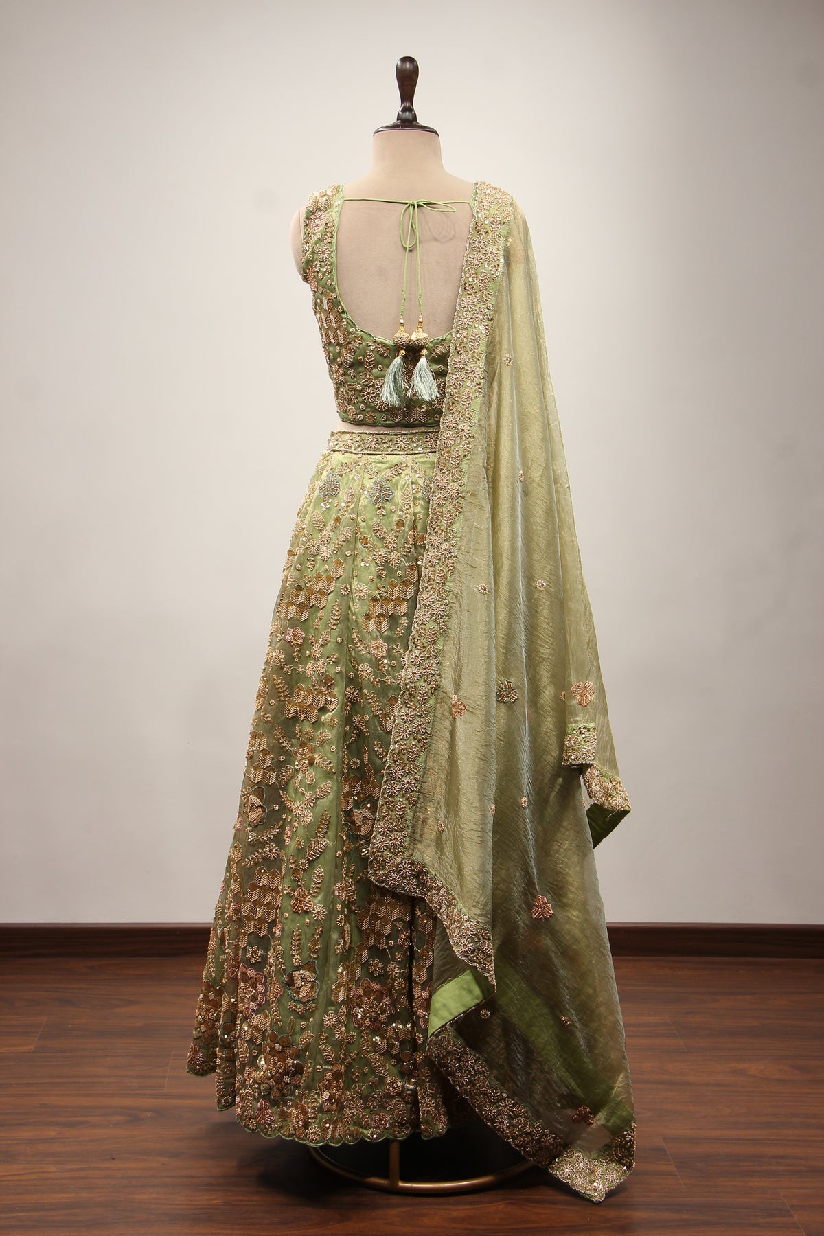 Green Shimmer Organza Lehenga with Bead & Zari Handwork Crop Top – back view