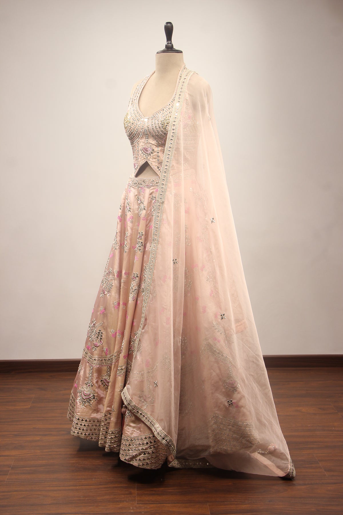 Baby Pink Tissue Lehenga with Mirror & Cut Dana Handwork Halter Corset – side view