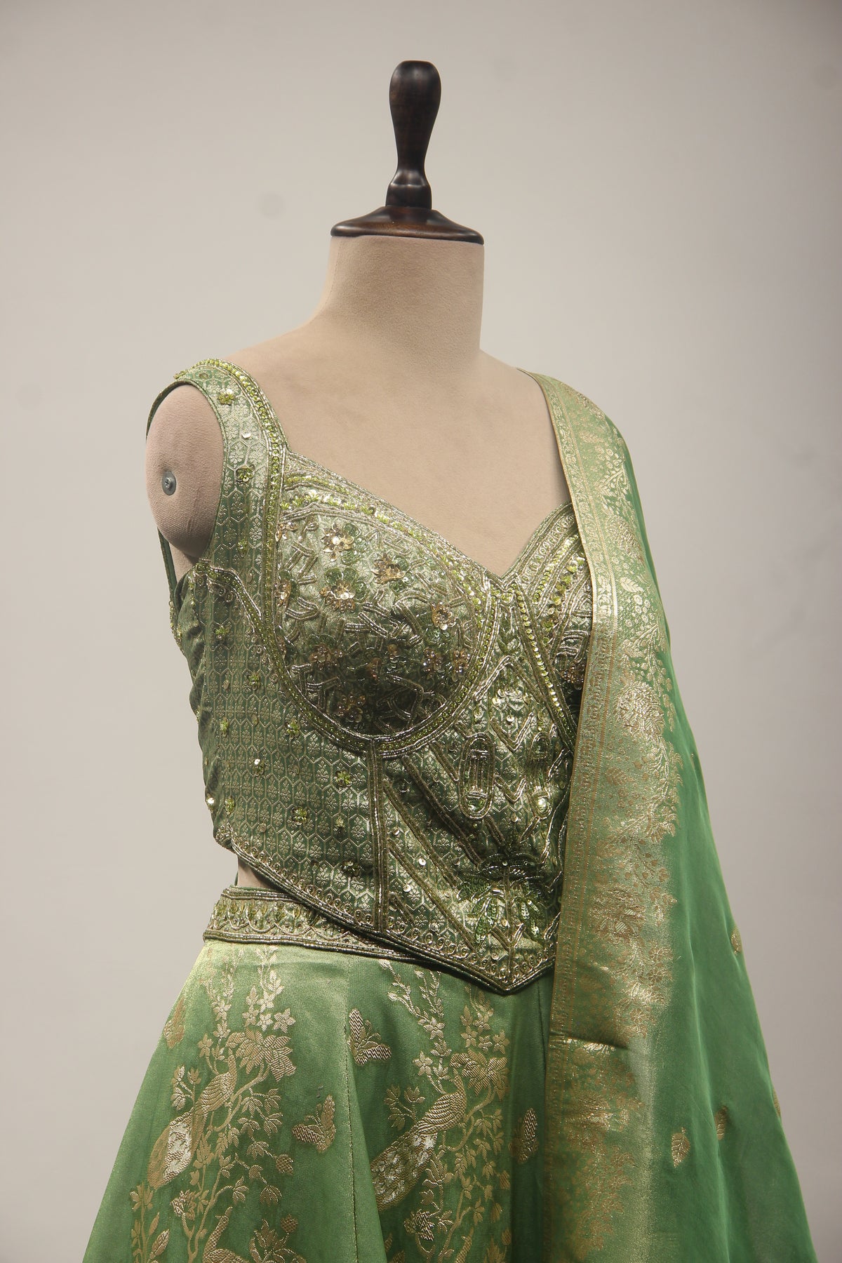 Green Banarasi Brocade Lehenga with Zardozi & Cut Dana Handwork Corset – other side close-up