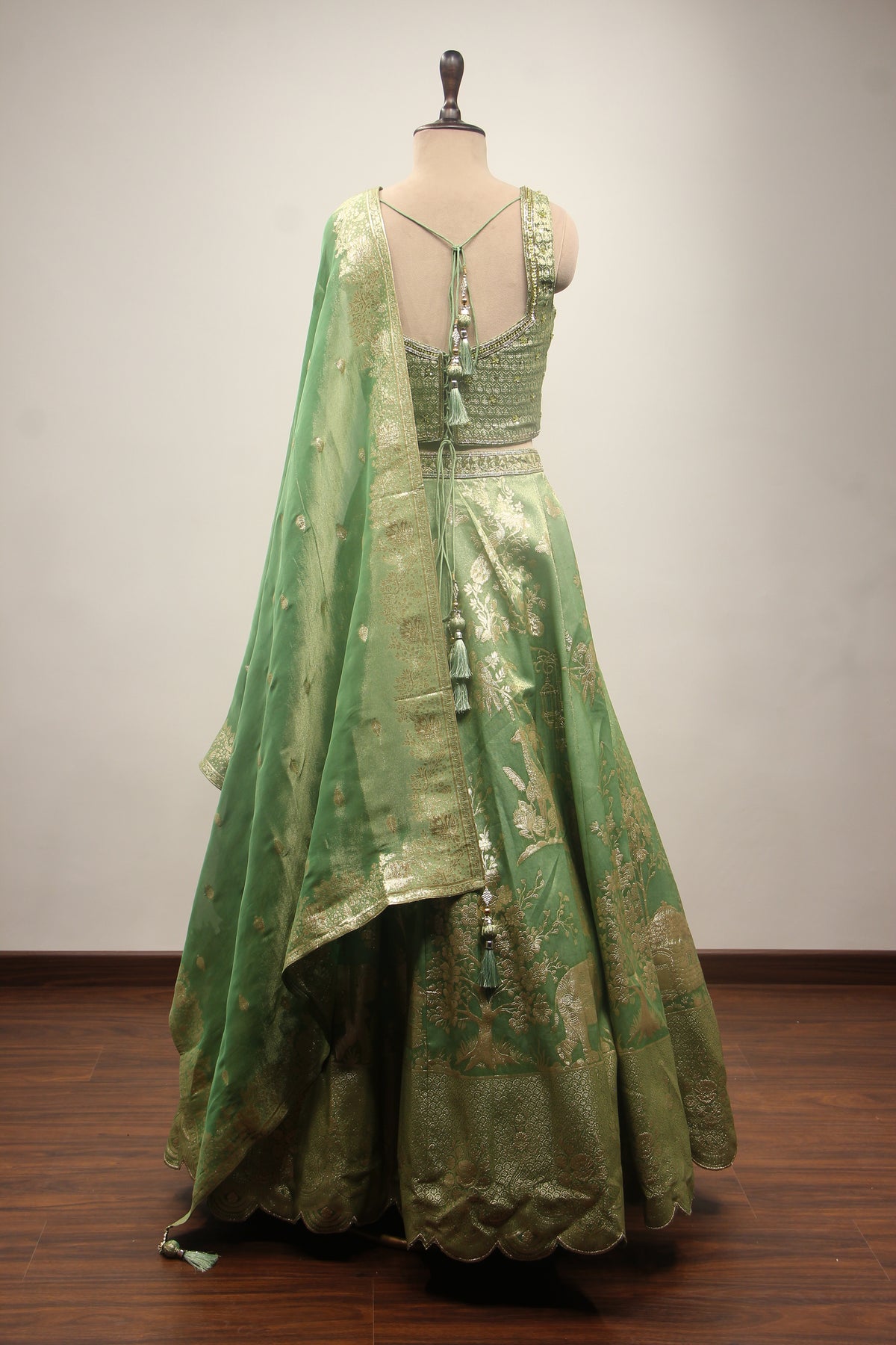 Green Banarasi Brocade Lehenga with Zardozi & Cut Dana Handwork Corset – back view