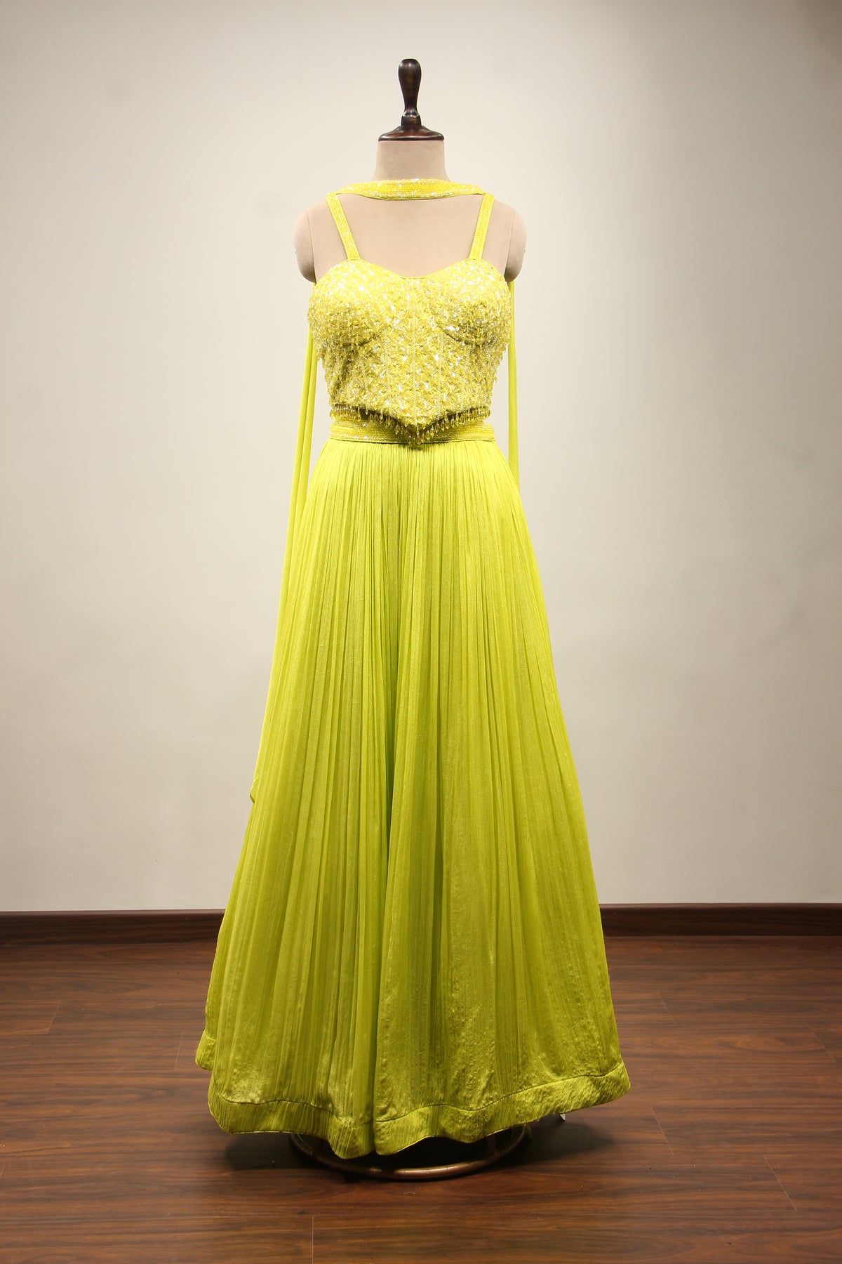 Crepe Lehenga with Sequin & Cut Dana Handwork Corset & Choker Dupatta in Green – front view