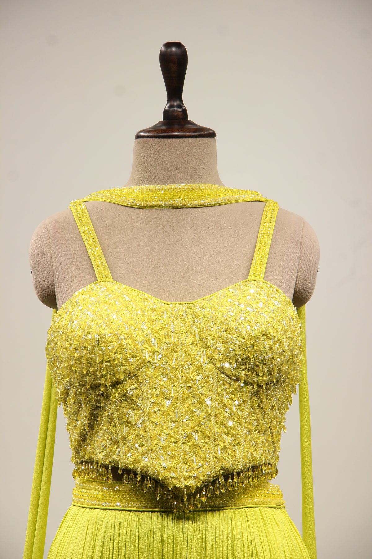 Crepe Lehenga with Sequin & Cut Dana Handwork Corset & Choker Dupatta in Green – front close-up