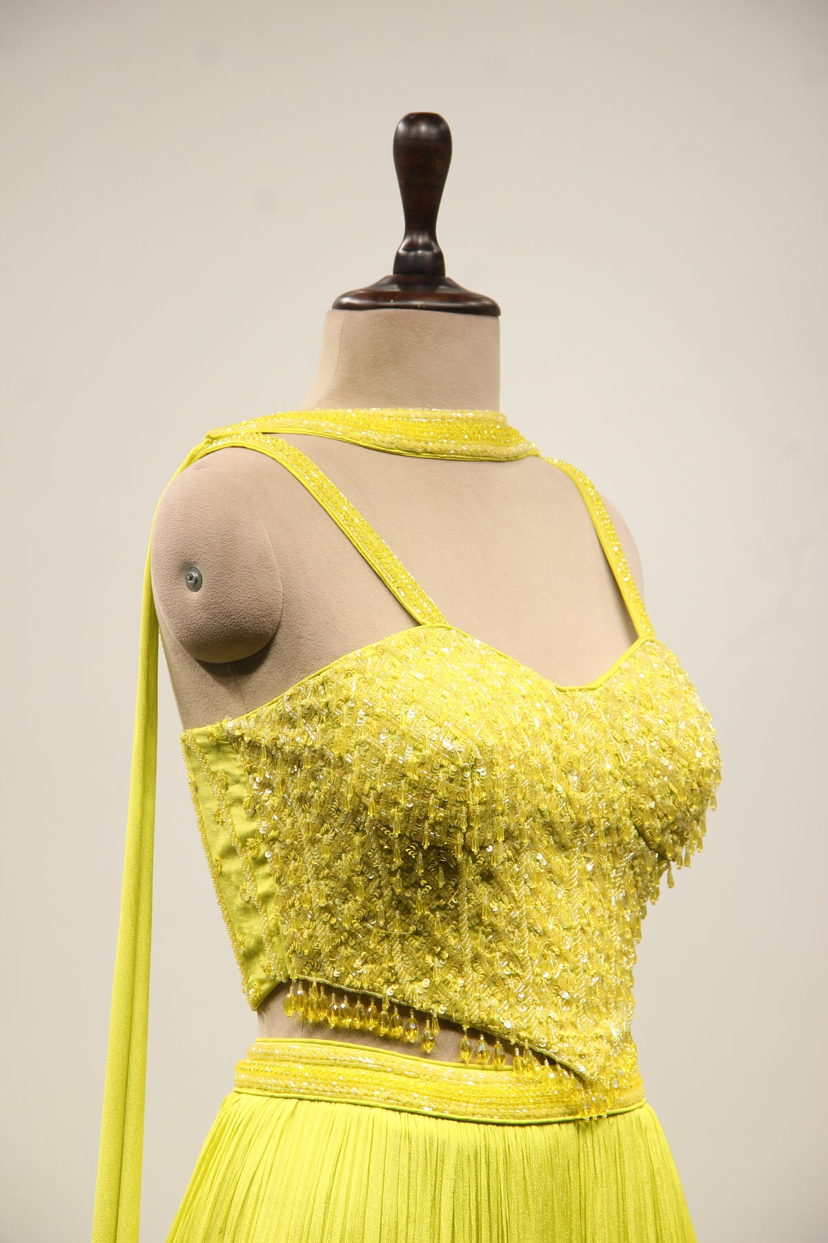 Crepe Lehenga with Sequin & Cut Dana Handwork Corset & Choker Dupatta in Green – other side close-up