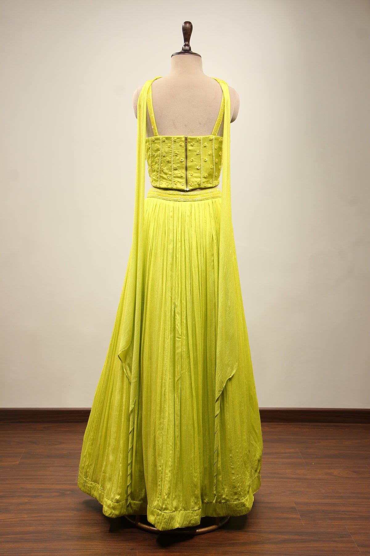Crepe Lehenga with Sequin & Cut Dana Handwork Corset & Choker Dupatta in Green – back view