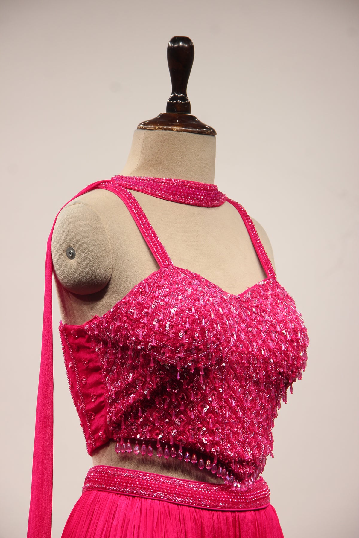 Crepe Lehenga with Sequin & Cut Dana Handwork Corset & Choker Dupatta in Pink – side close-up
