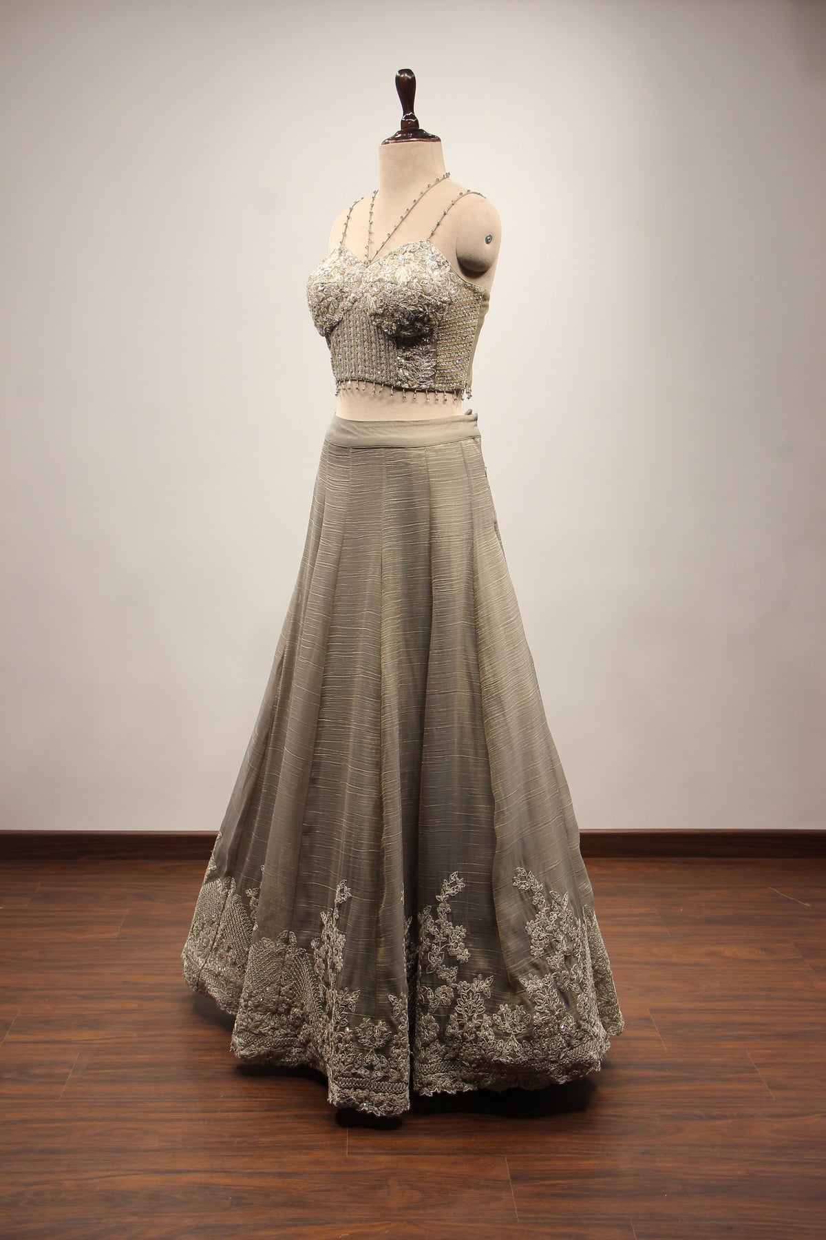 Grey Tissue Corset Lehenga with Sequin & Stone Handwork and Net Shrug – side view, without shrug