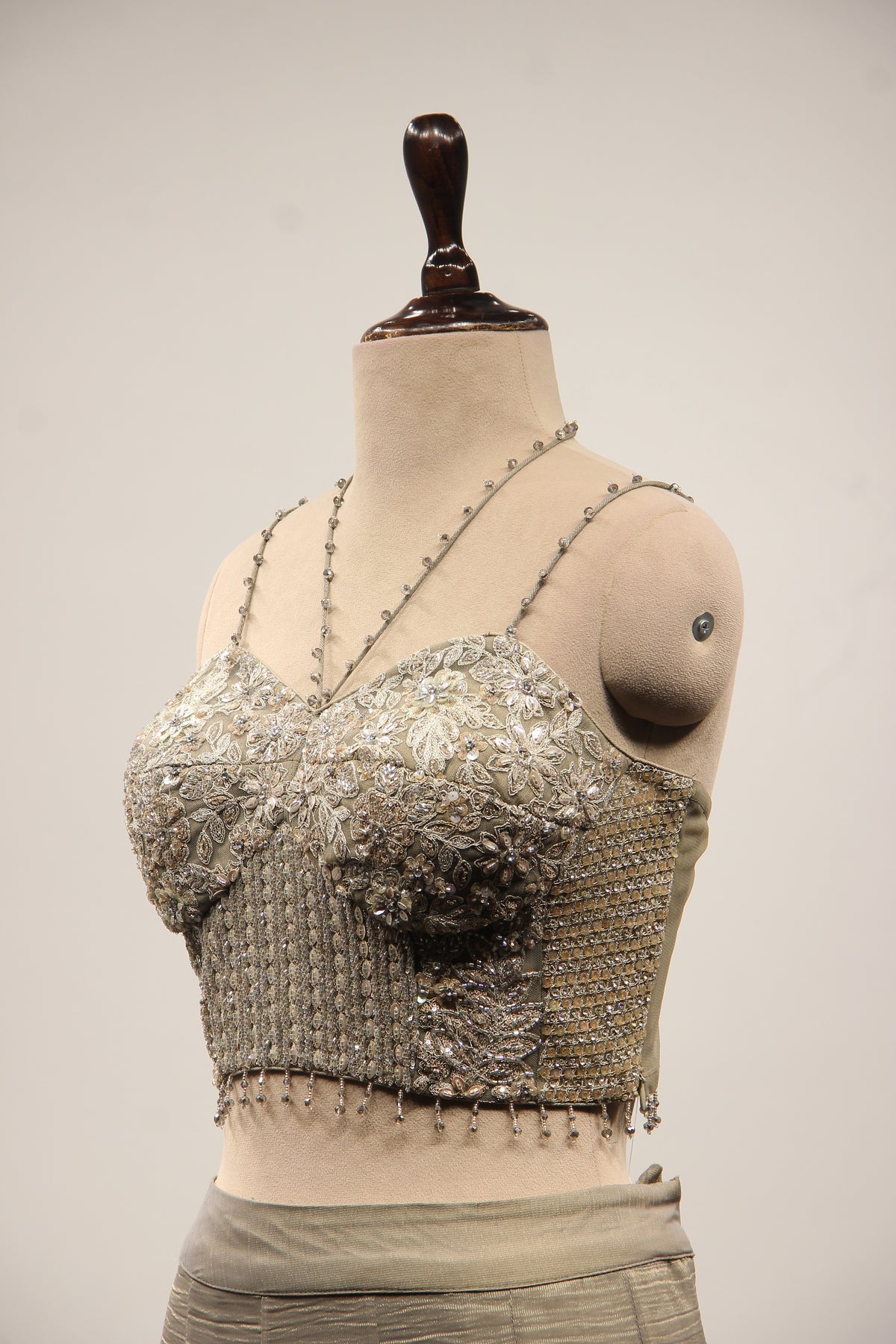 Grey Tissue Corset Lehenga with Sequin & Stone Handwork and Net Shrug – side close-up, without shrug