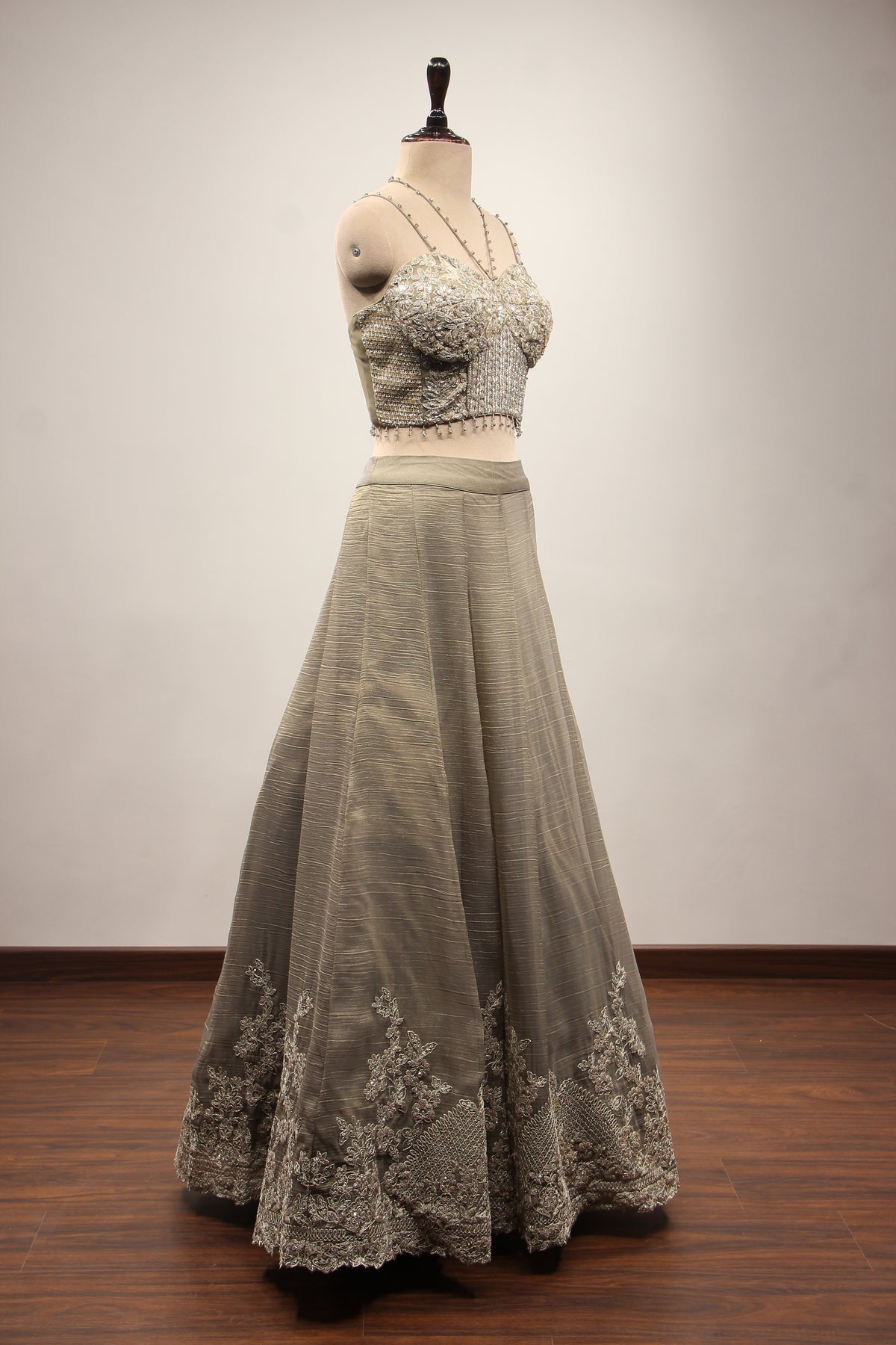Grey Tissue Corset Lehenga with Sequin & Stone Handwork and Net Shrug – other side view, without shrug