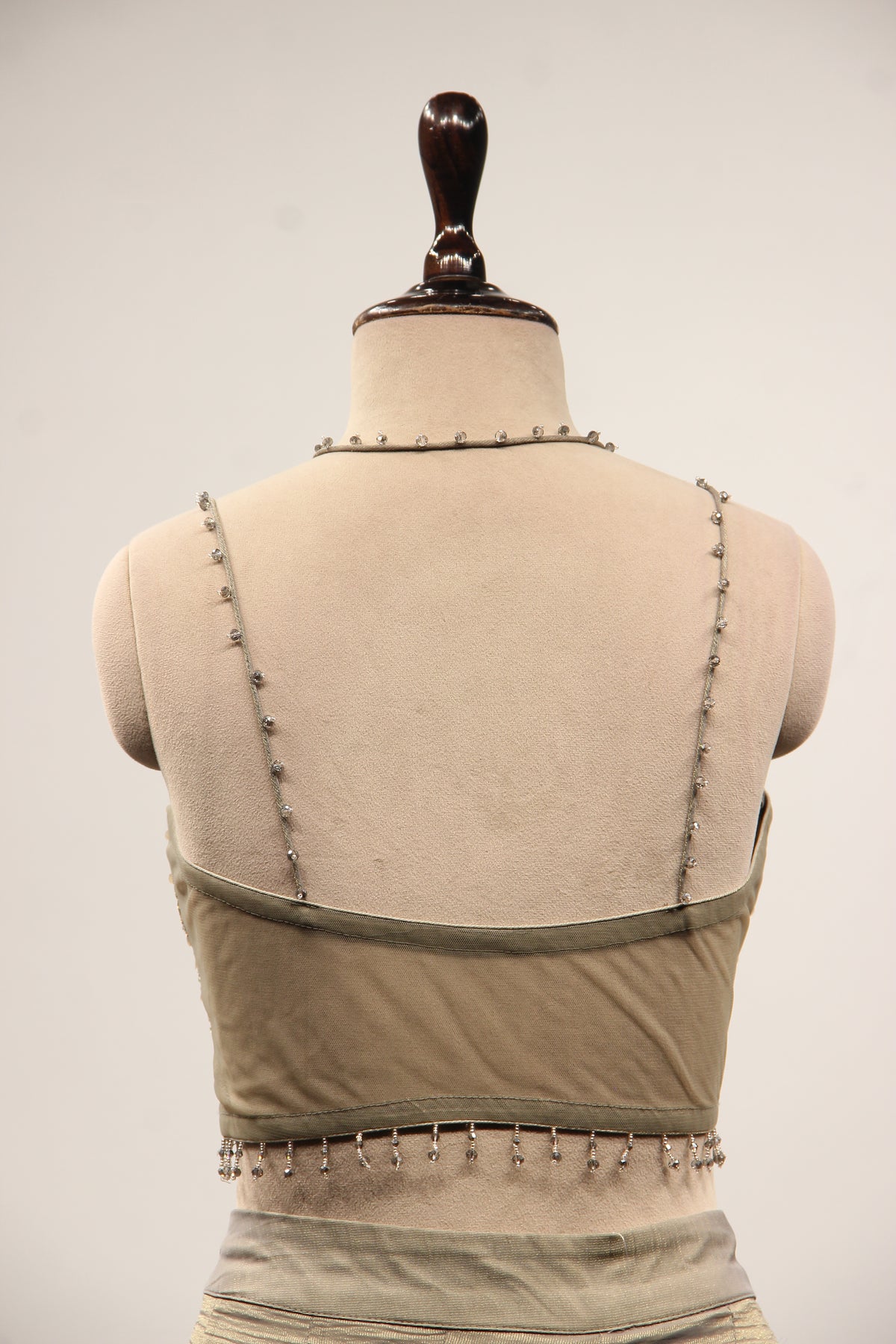 Grey Tissue Corset Lehenga with Sequin & Stone Handwork and Net Shrug – back close-up, without shrug