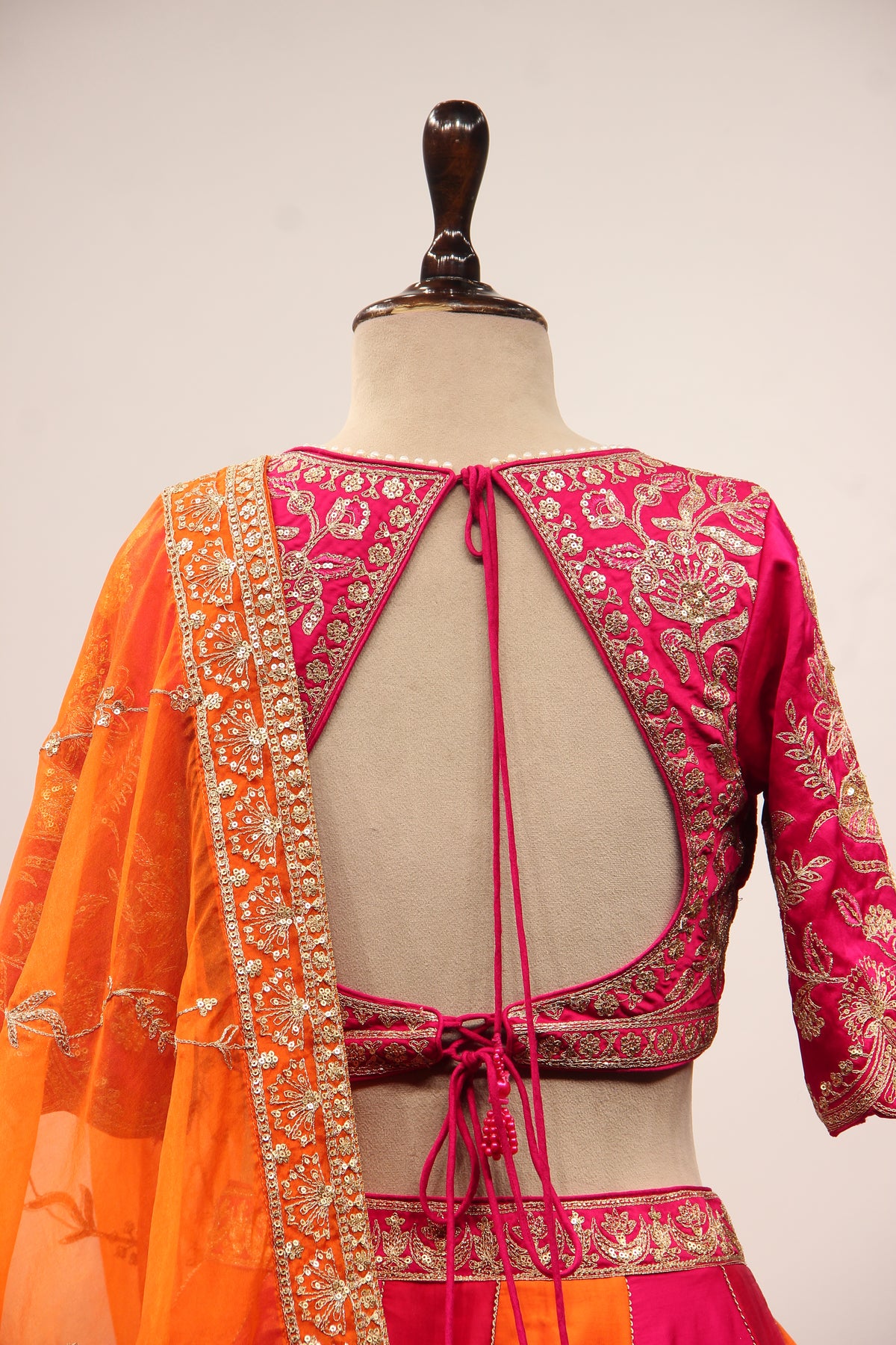 Orange Silk Panelled Lehenga with Zari & Sequin Handwork Crop Top – back close-up