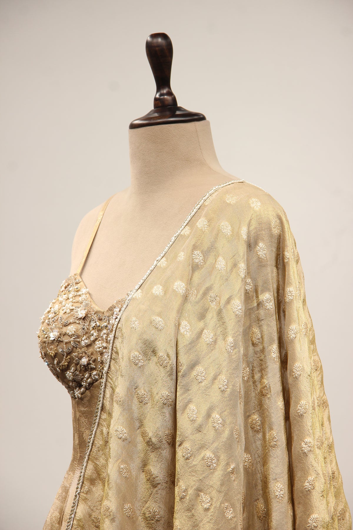 Tissue & Brocade Peplum Suit with Hand Embroidery & Sequin Handwork in Gold – side close-up