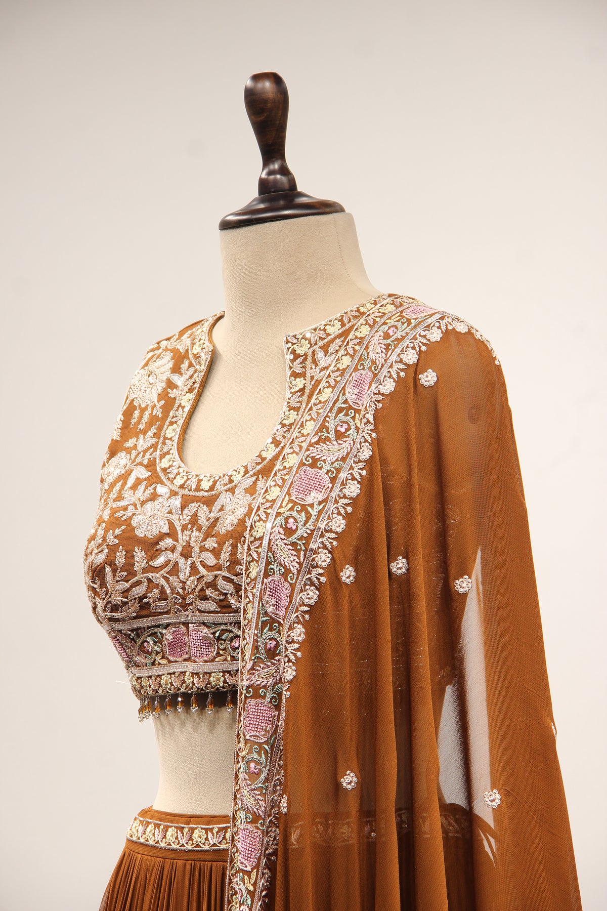 Georgette Lehenga with Resham & Cut Dana Handwork and Beaded Crop Top in Brown – side close-up