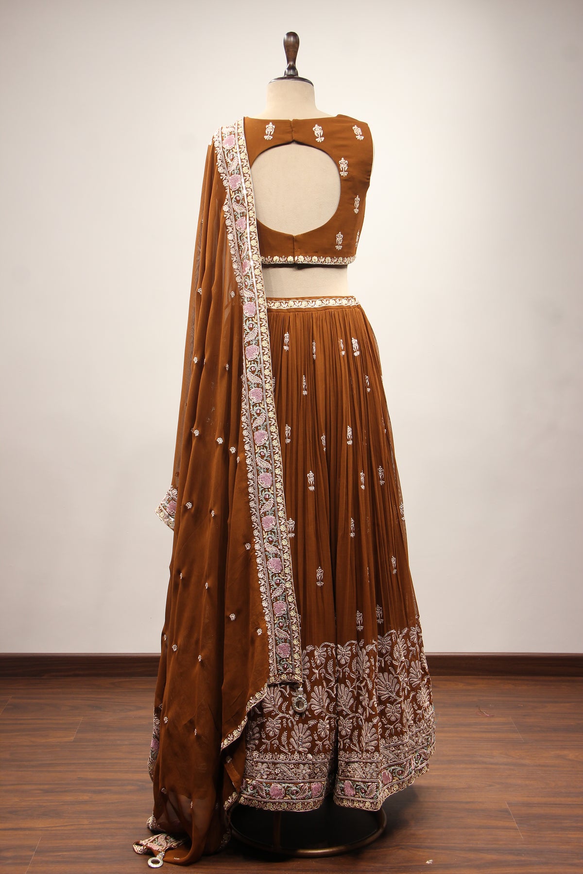 Georgette Lehenga with Resham & Cut Dana Handwork and Beaded Crop Top in Brown – back view