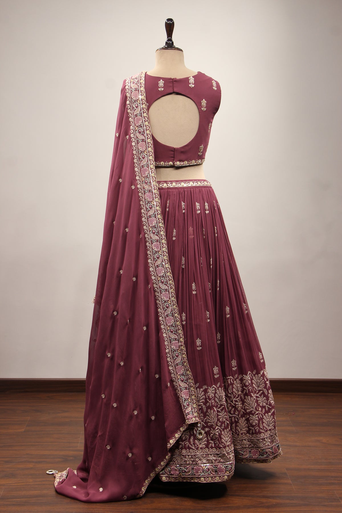Georgette Lehenga with Resham & Cut Dana Handwork and Beaded Crop Top in Wine – back view