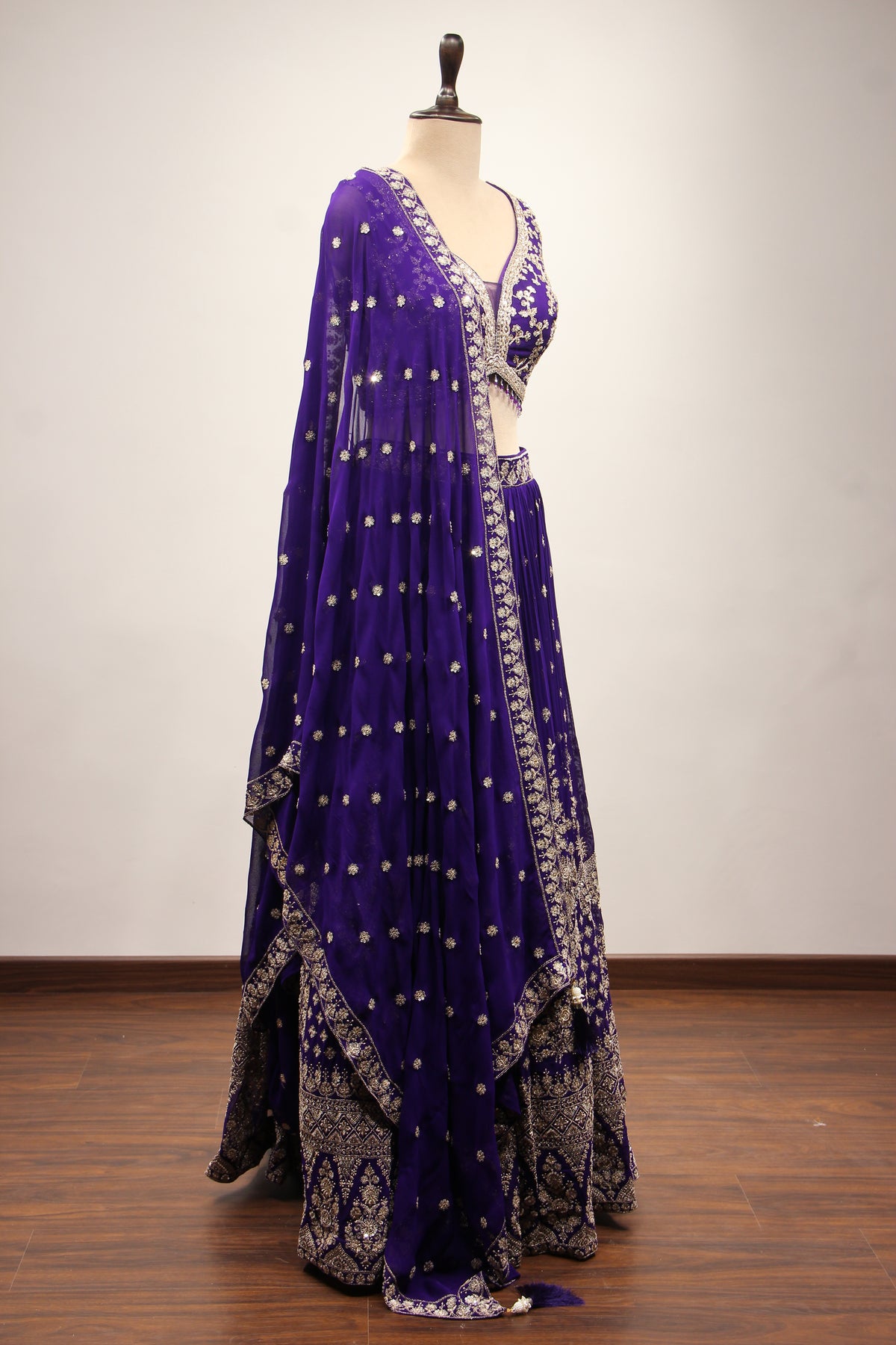 Georgette Lehenga with Zari & Sequin Handwork Plunge V-Neck Crop Top in Purple – other side view
