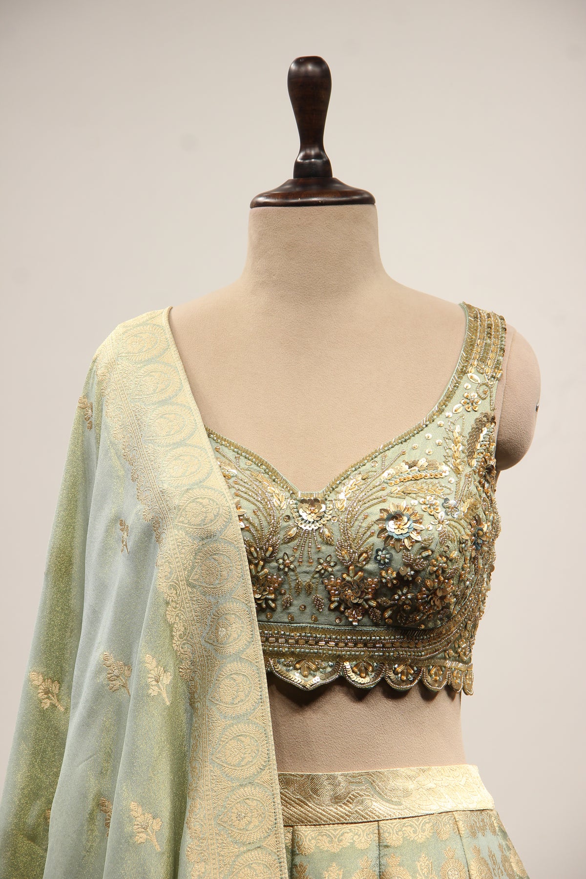 Pista Green Banarasi Brocade Lehenga with Hand Embroidery & Cut Dana – front close-up