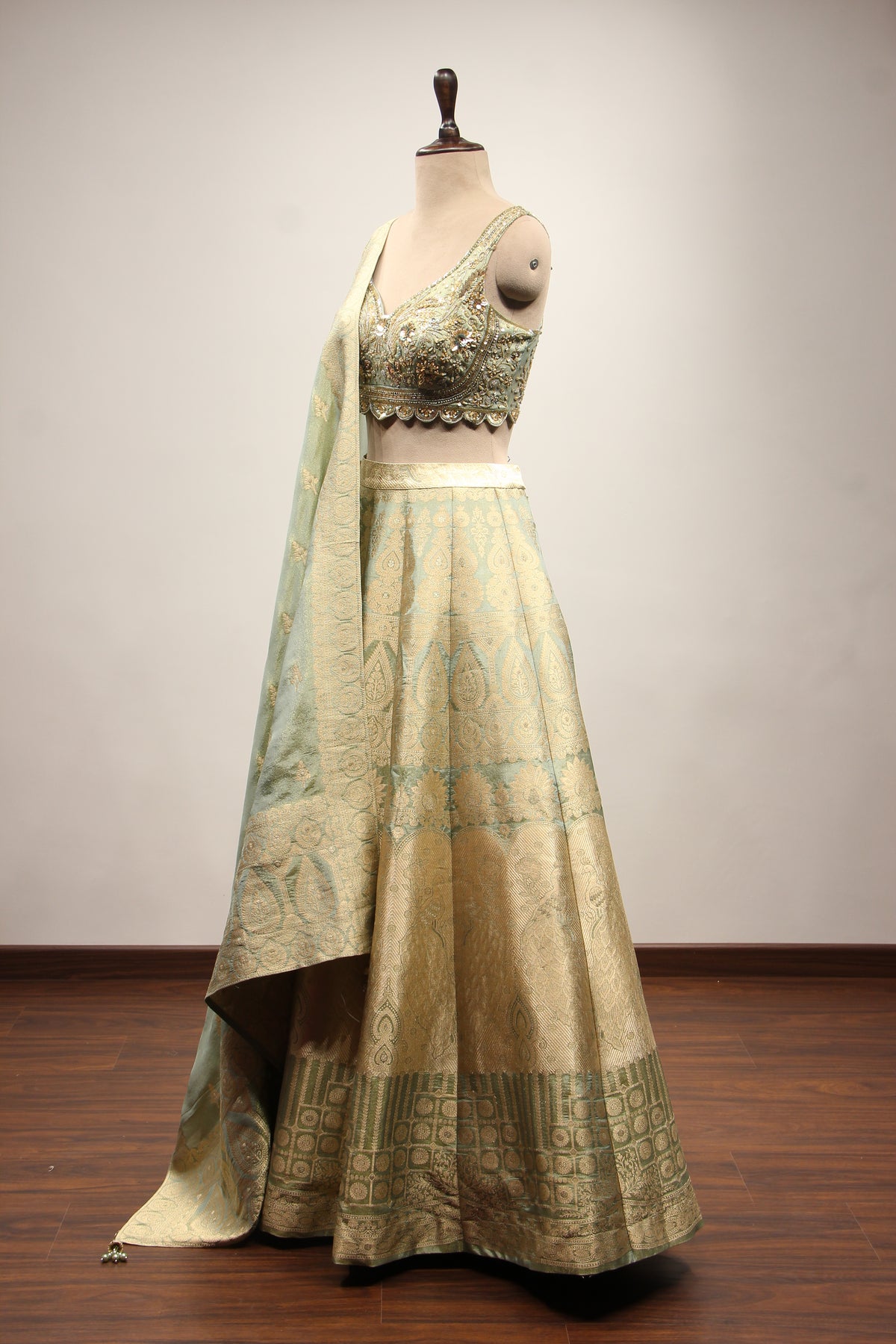 Pista Green Banarasi Brocade Lehenga with Hand Embroidery & Cut Dana – side view