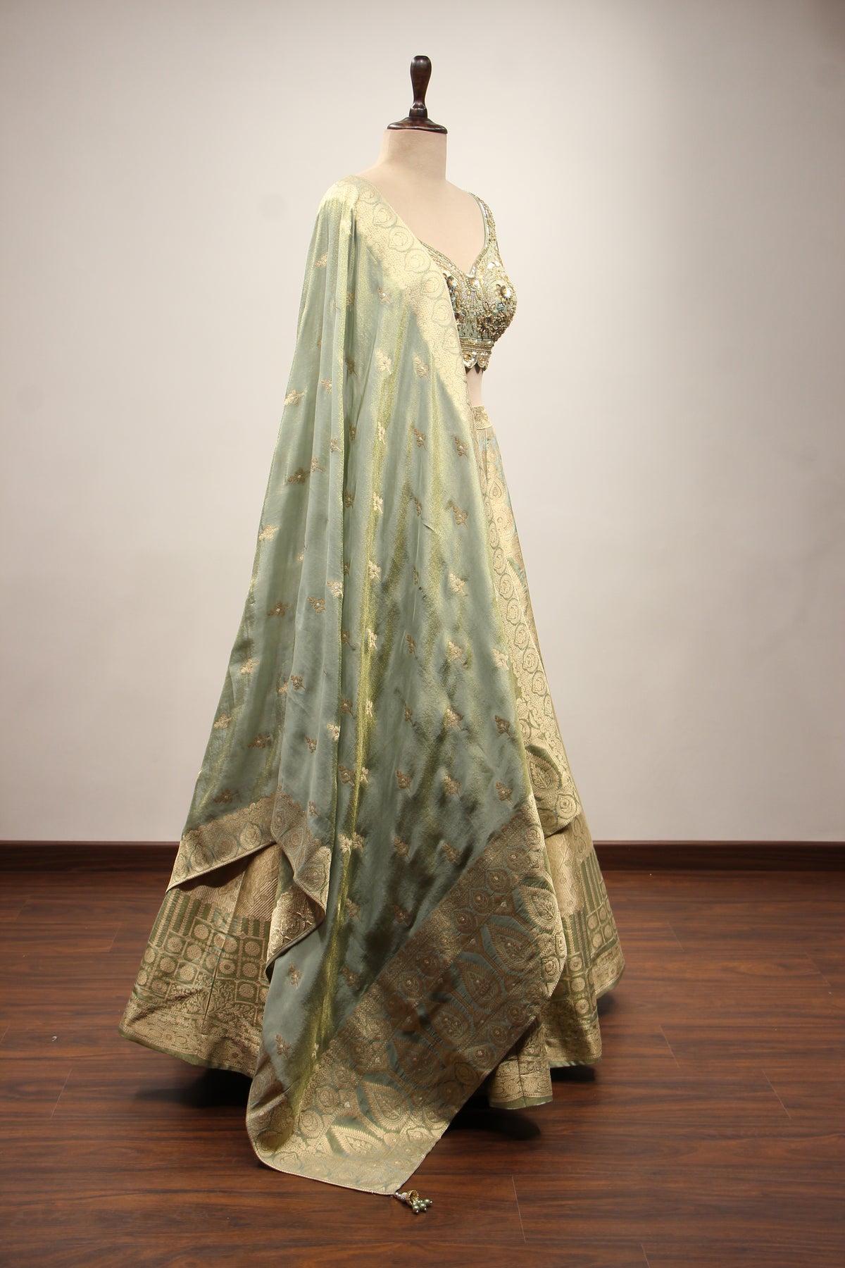 Pista Green Banarasi Brocade Lehenga with Hand Embroidery & Cut Dana – other side view