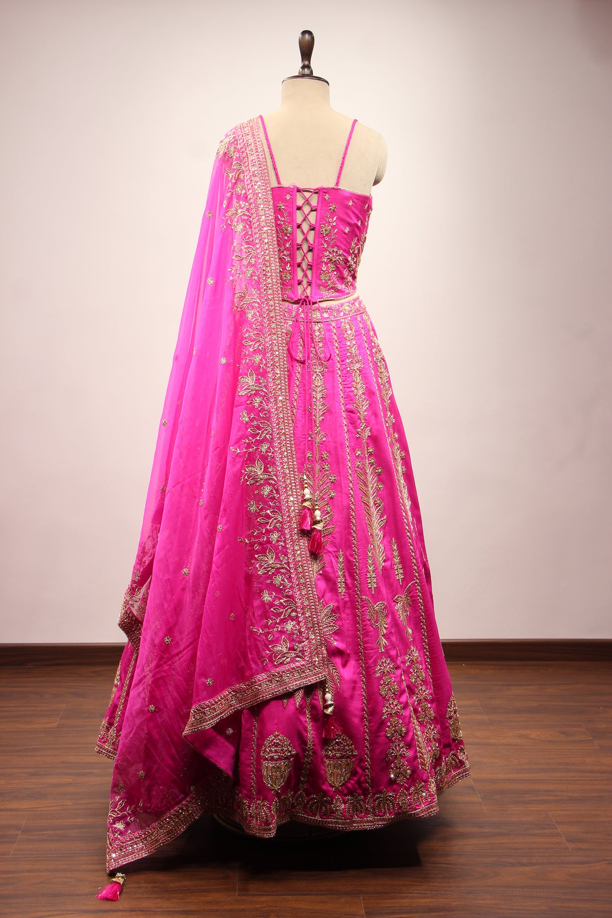 Royal Blue Dupion Lehenga with Corset Blouse, Zari & Cut Dana Handwork in Pink – back view