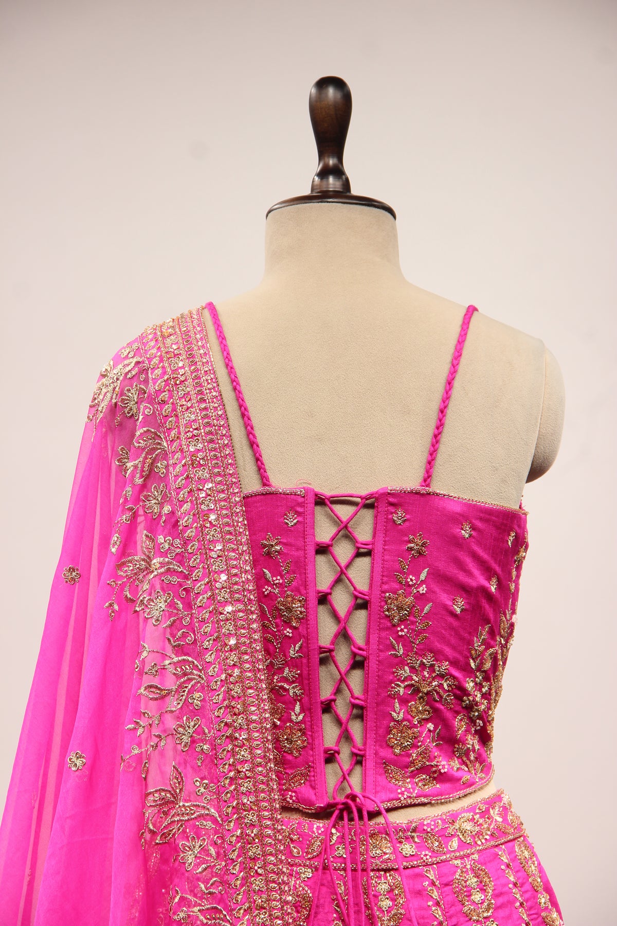 Royal Blue Dupion Lehenga with Corset Blouse, Zari & Cut Dana Handwork in Pink – back close-up