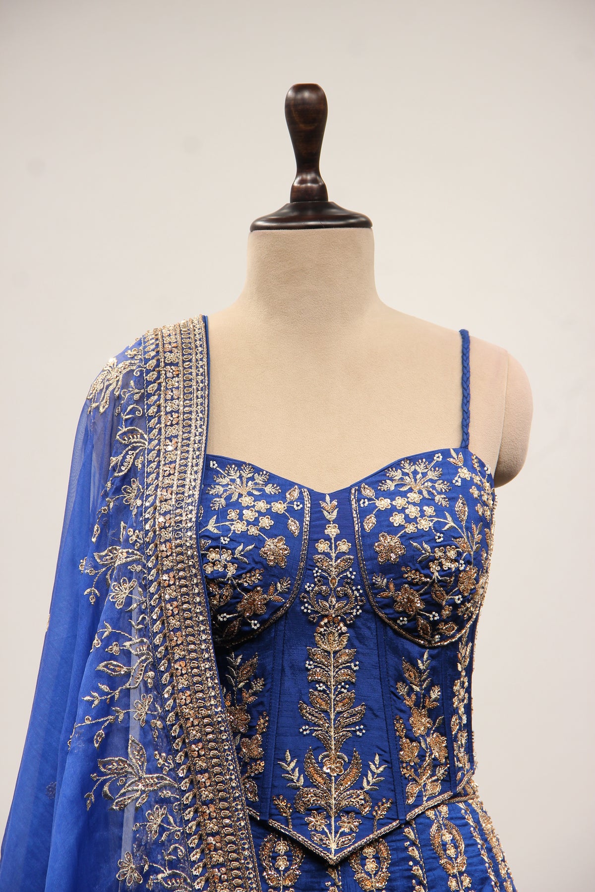 Royal Blue Dupion Lehenga with Corset Blouse, Zari & Cut Dana Handwork in Blue – front close-up