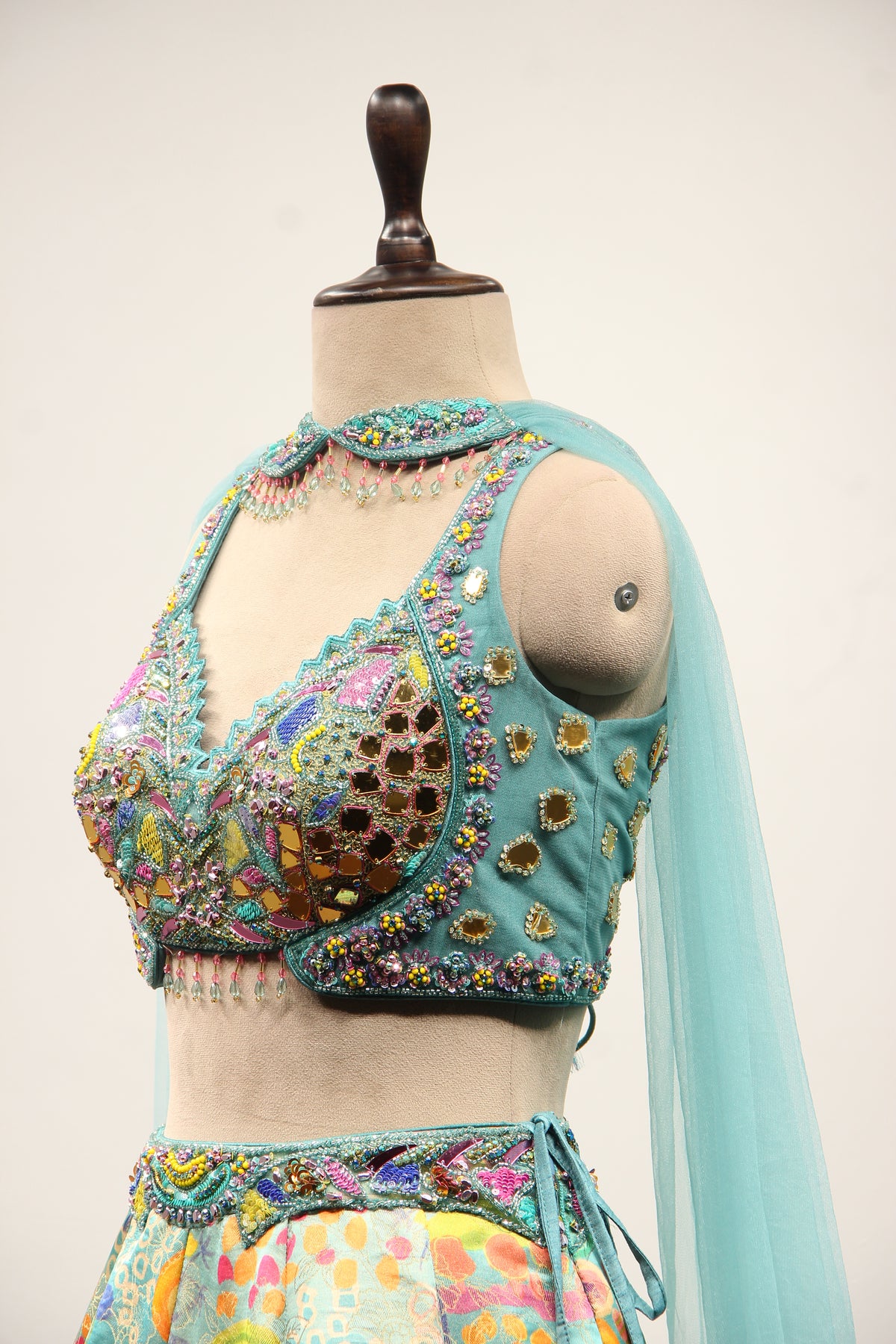 Blue Printed Tissue Lehenga with Hand Embroidery & Mirror Crop Top – side close-up