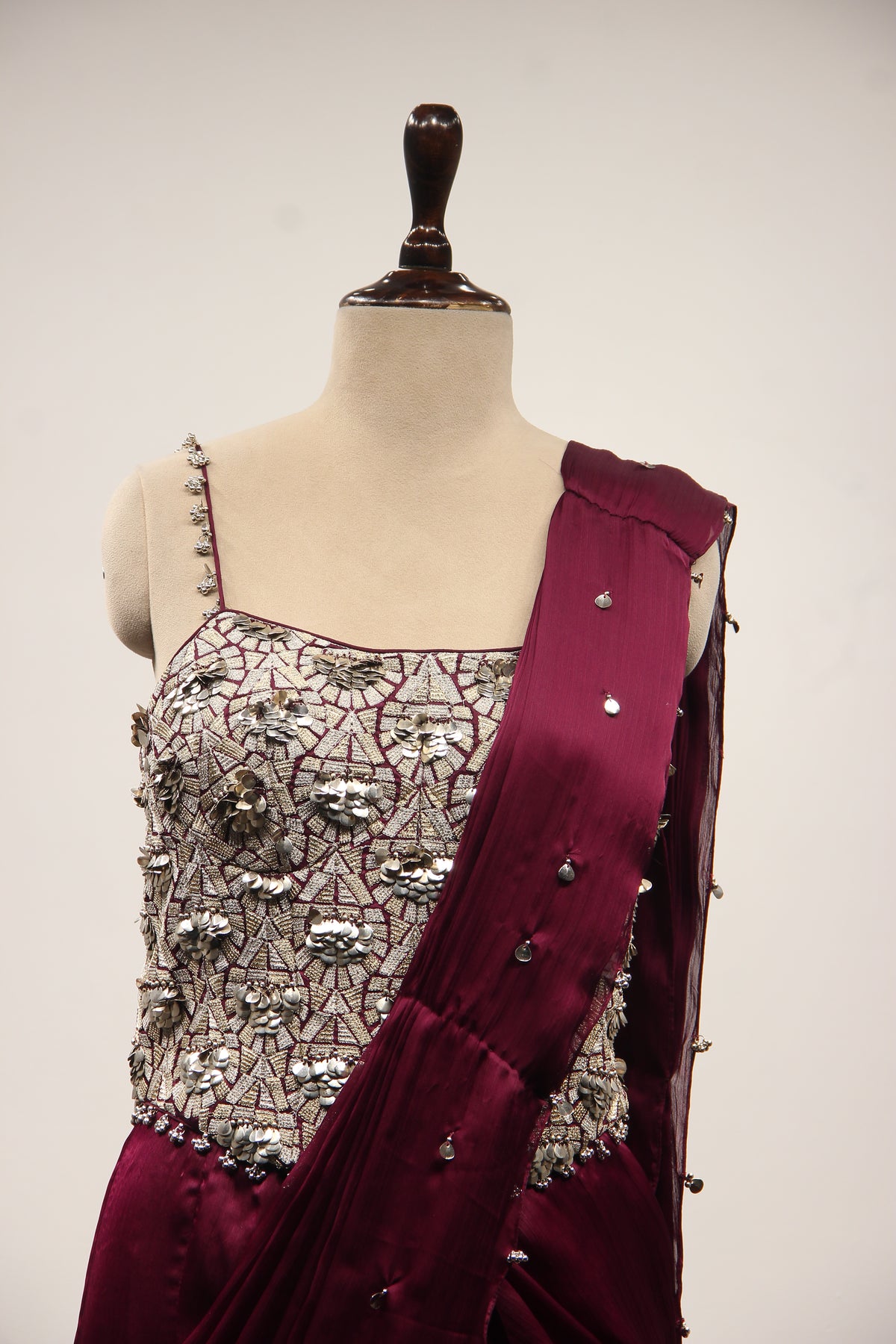 Wine Crepe Drape Saree with Zari & Sequin Handwork Strappy Corset – front close-up