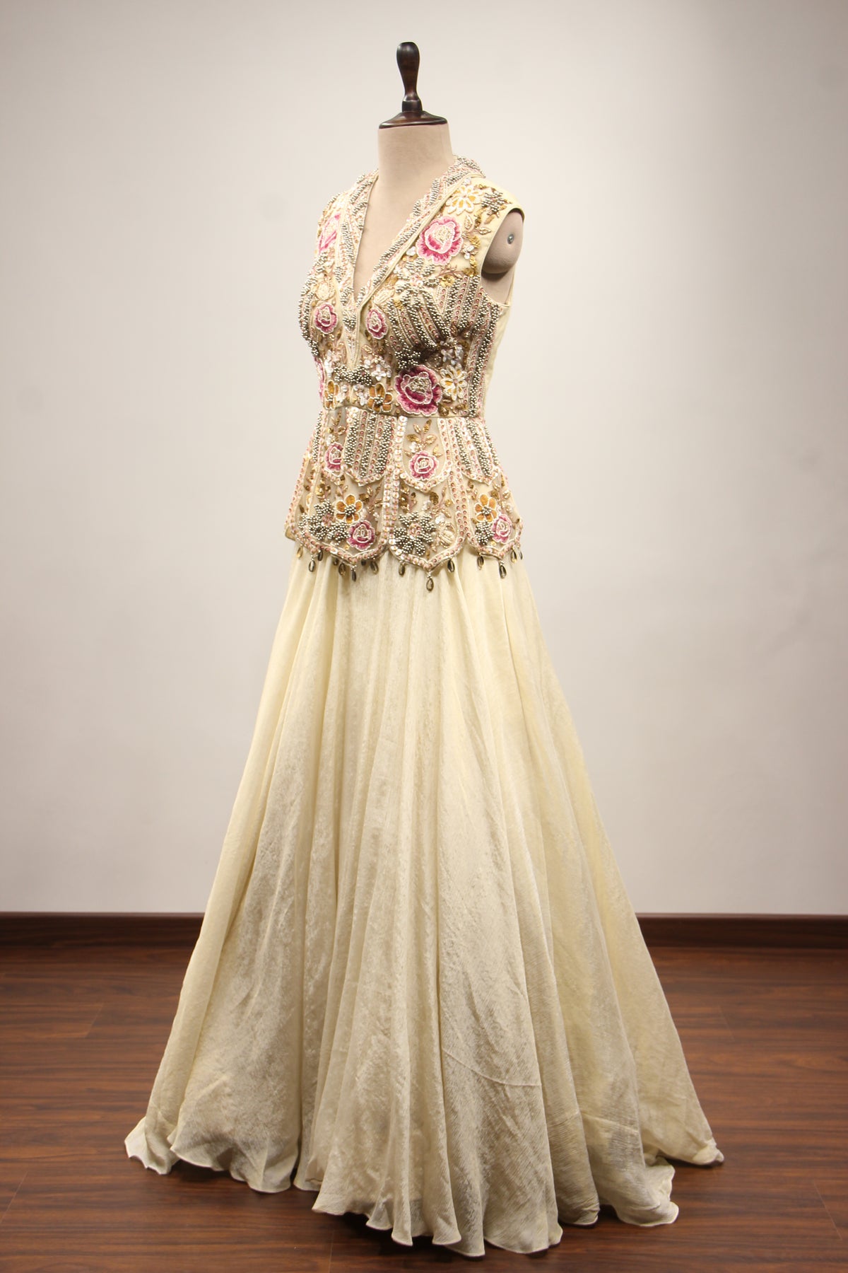 Off White Tissue Lehenga with Resham & Bead Handwork Floral Peplum Top – side view