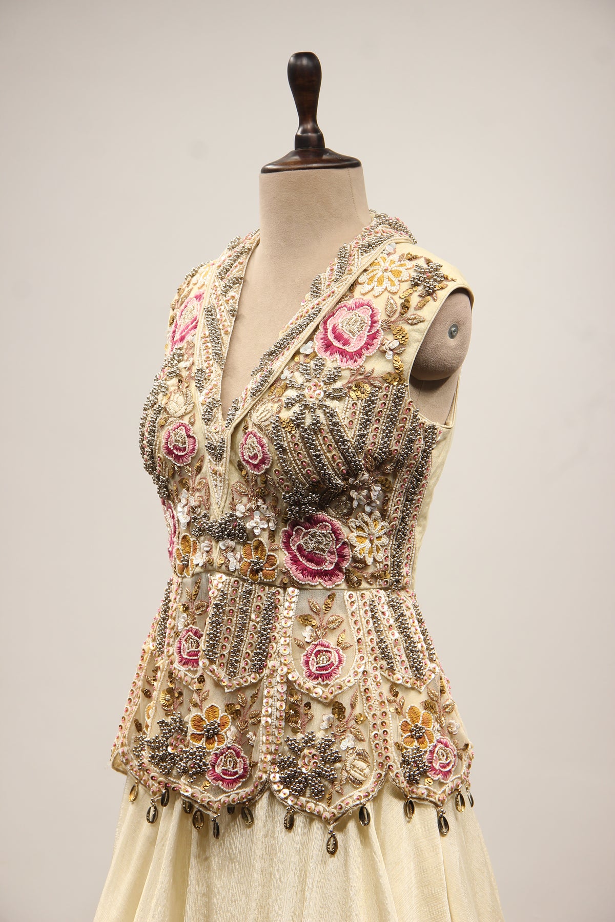 Off White Tissue Lehenga with Resham & Bead Handwork Floral Peplum Top – side close-up