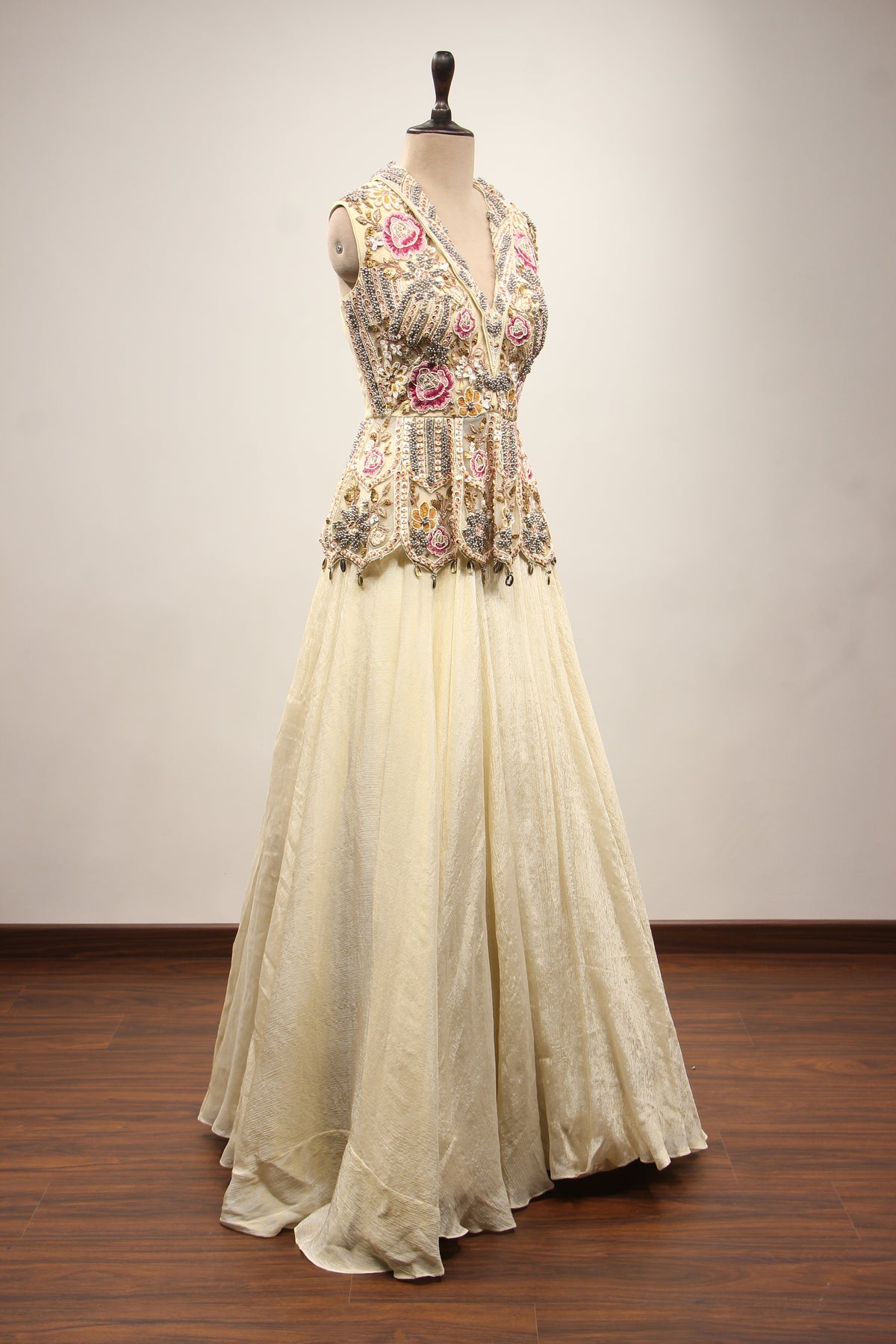 Off White Tissue Lehenga with Resham & Bead Handwork Floral Peplum Top – other side view