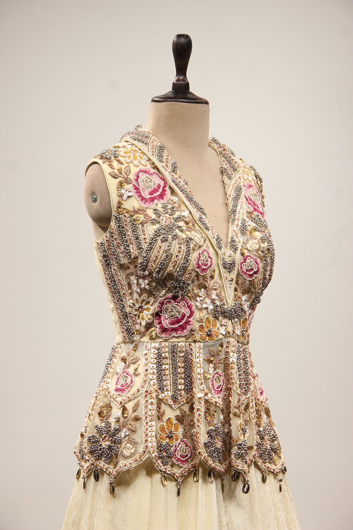 Off White Tissue Lehenga with Resham & Bead Handwork Floral Peplum Top – other side close-up