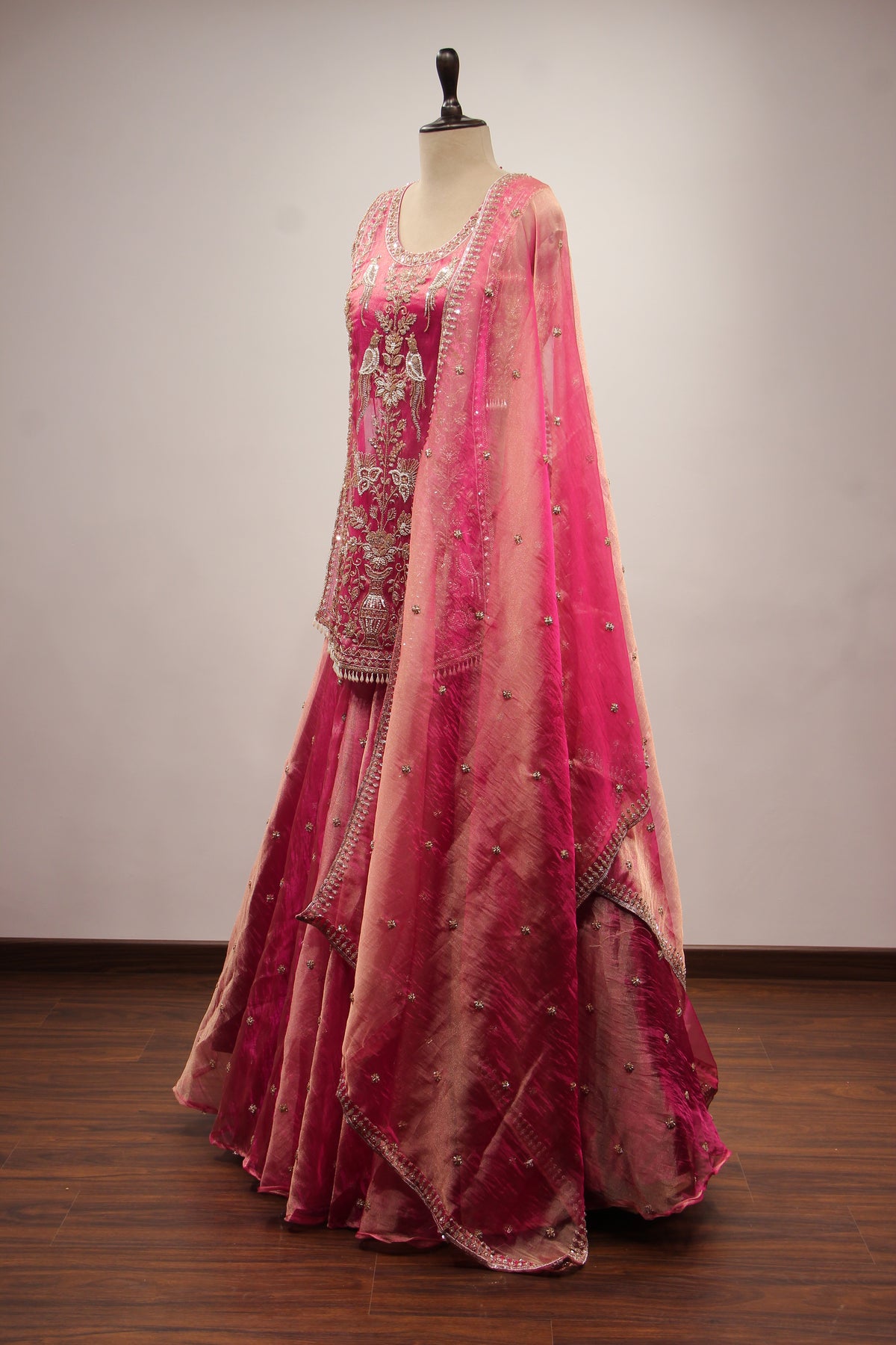 Rani Tissue Lehenga with Bead & Cut Dana Handwork Sleeveless Long Top – side view