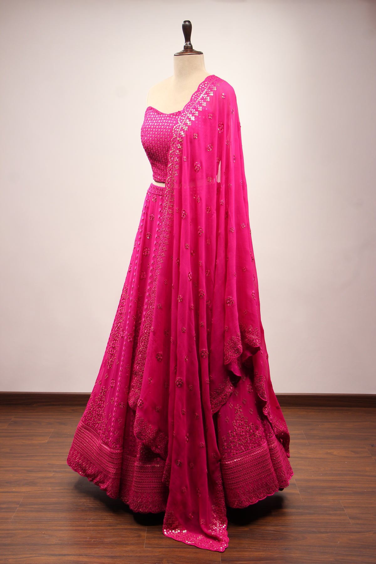 Rani Georgette Off Shoulder Lehenga with Resham & Sequin Handwork – side view