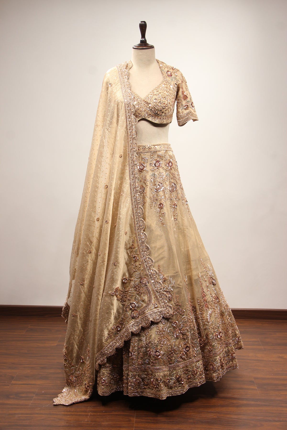 Gold Tissue Lehenga with Resham & Sequin Handwork Half Sleeve Crop Top – front view