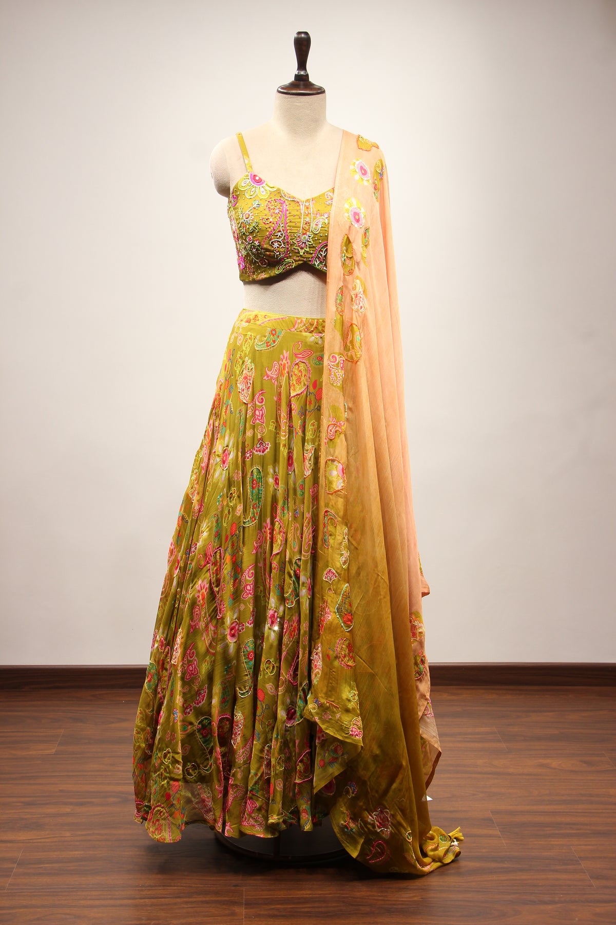 Mehendi Organza Lehenga with Printed & Cut Dana Handwork Strappy Top – front view
