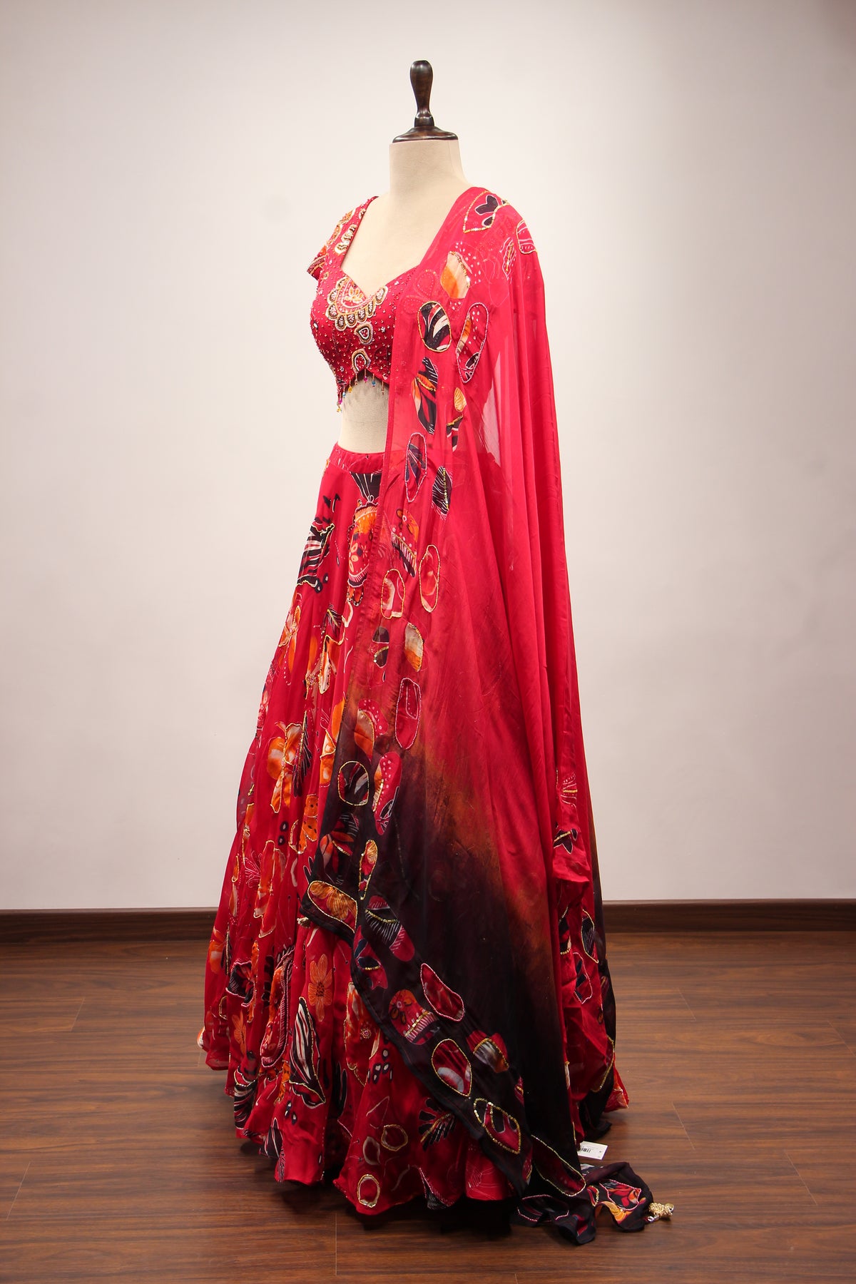 Red Organza Lehenga with Printed & Cut Dana Handwork Cap Sleeve Top – side view