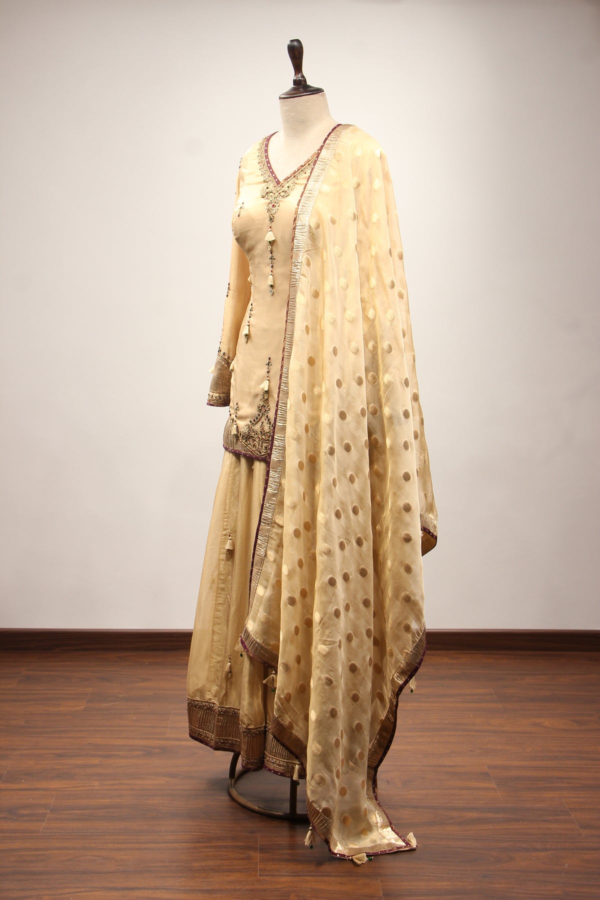 Tissue Sharara Suit with Gota Patti & Zari Handwork Brocade Dupatta in Gold – side view